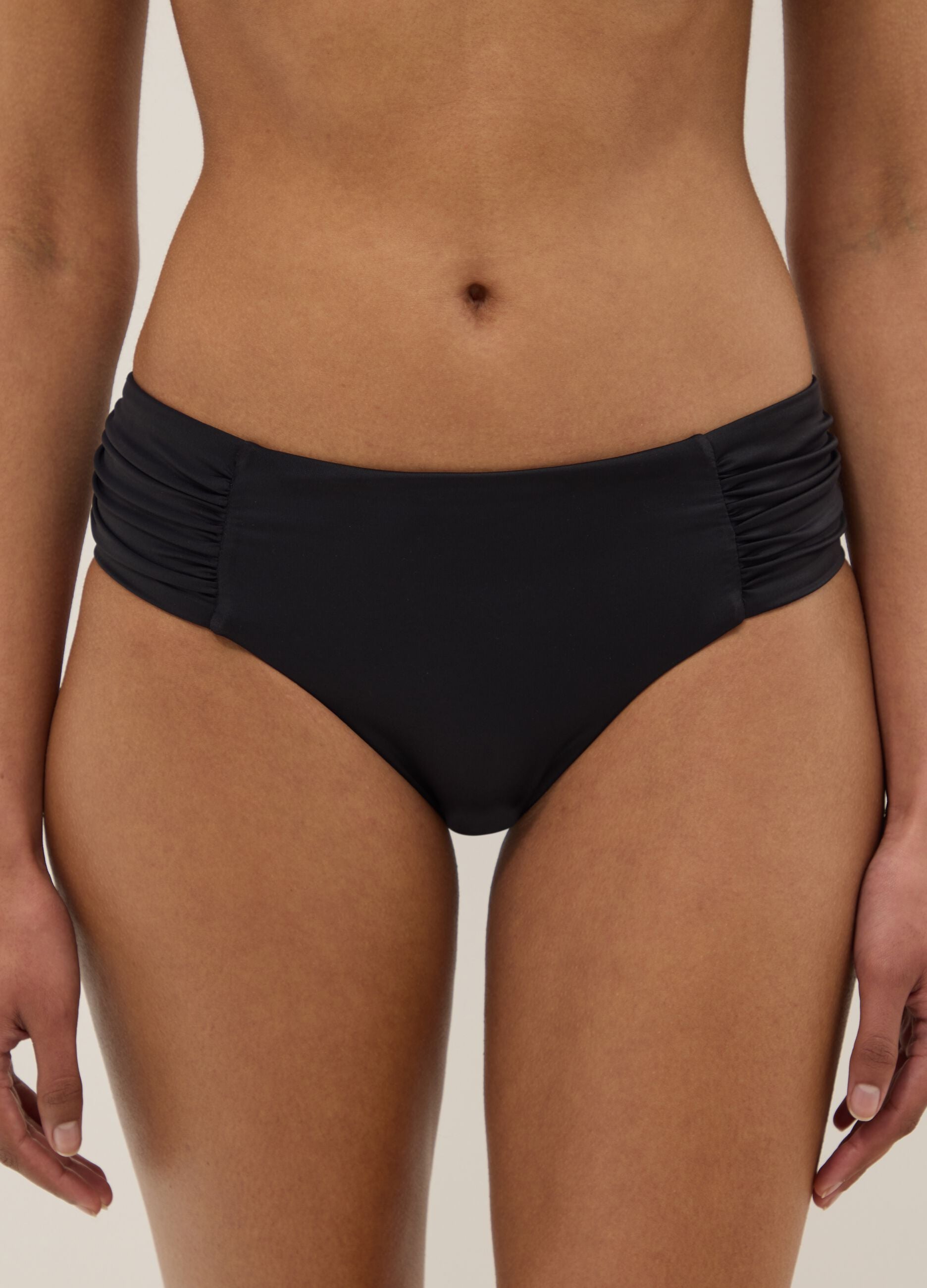 Black stretch swim briefs with side gathers