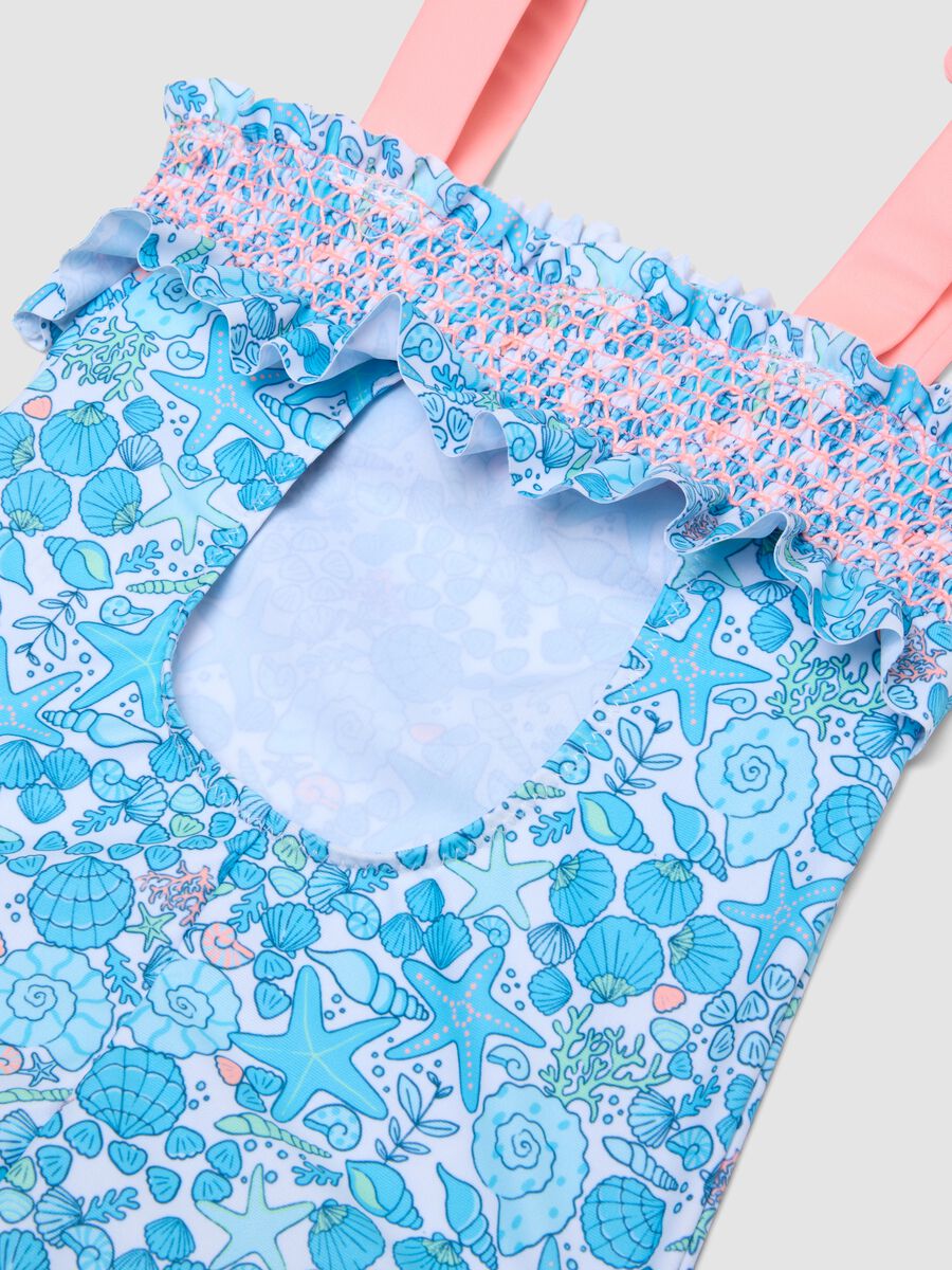 Blue stretch swimsuit with marine print for girls_3