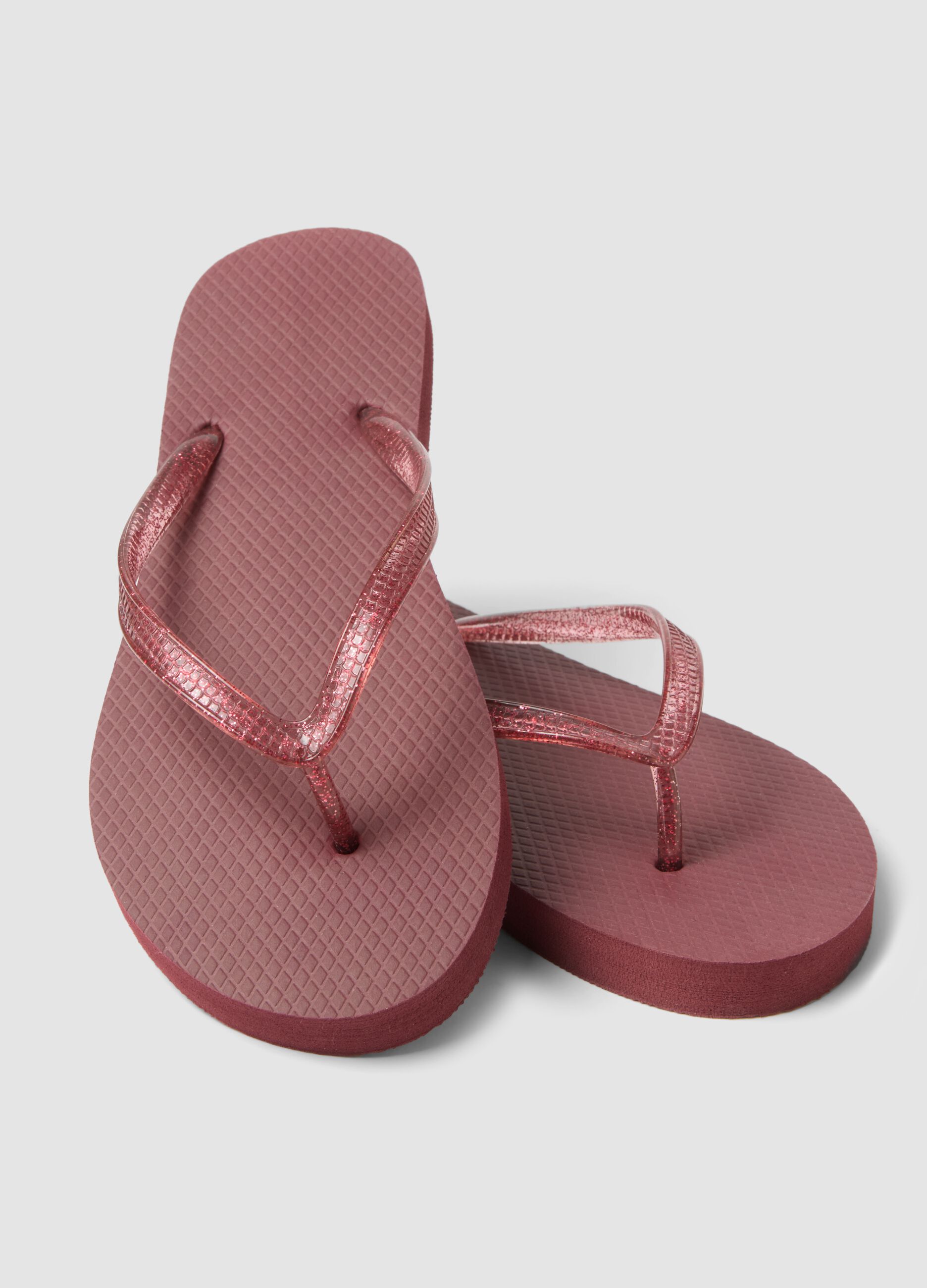 Pink flip-flops with translucent straps