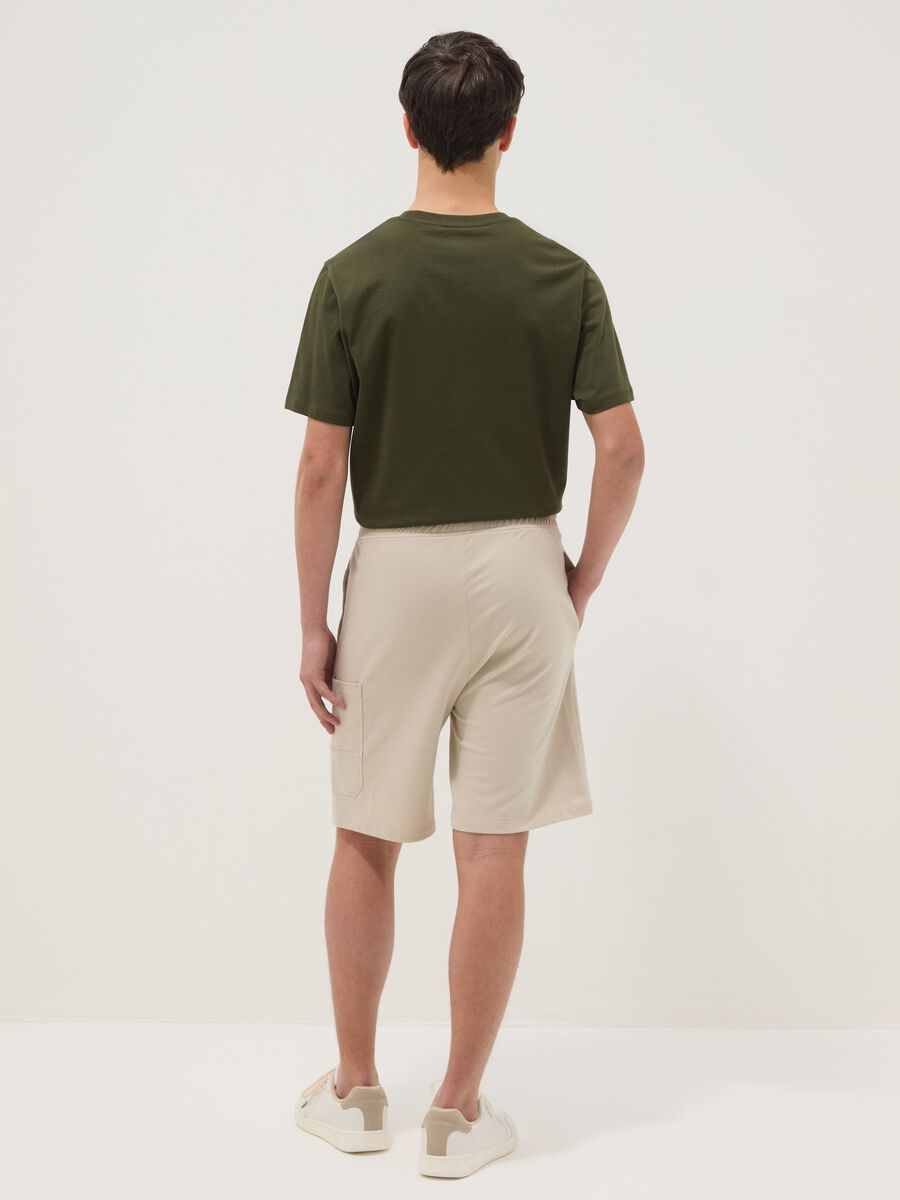 Shorts cargo in puro cotone beige da ragazzo oversize fit_1