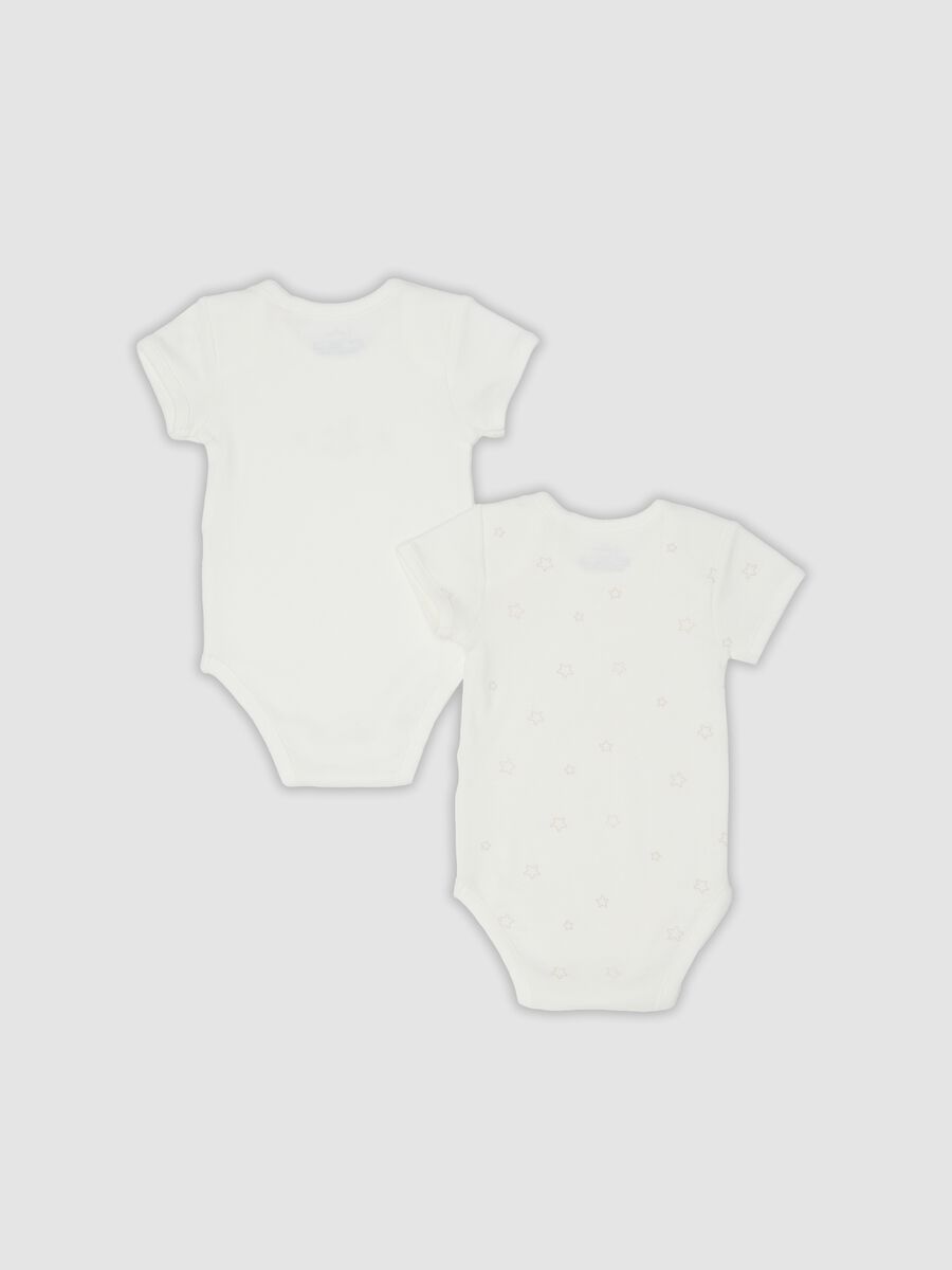 Two-pack of white organic cotton bodysuits with prints_1
