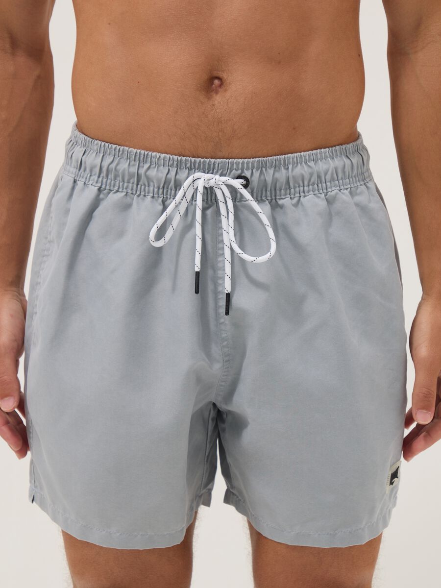 Blue swim shorts with drawstring waist_1