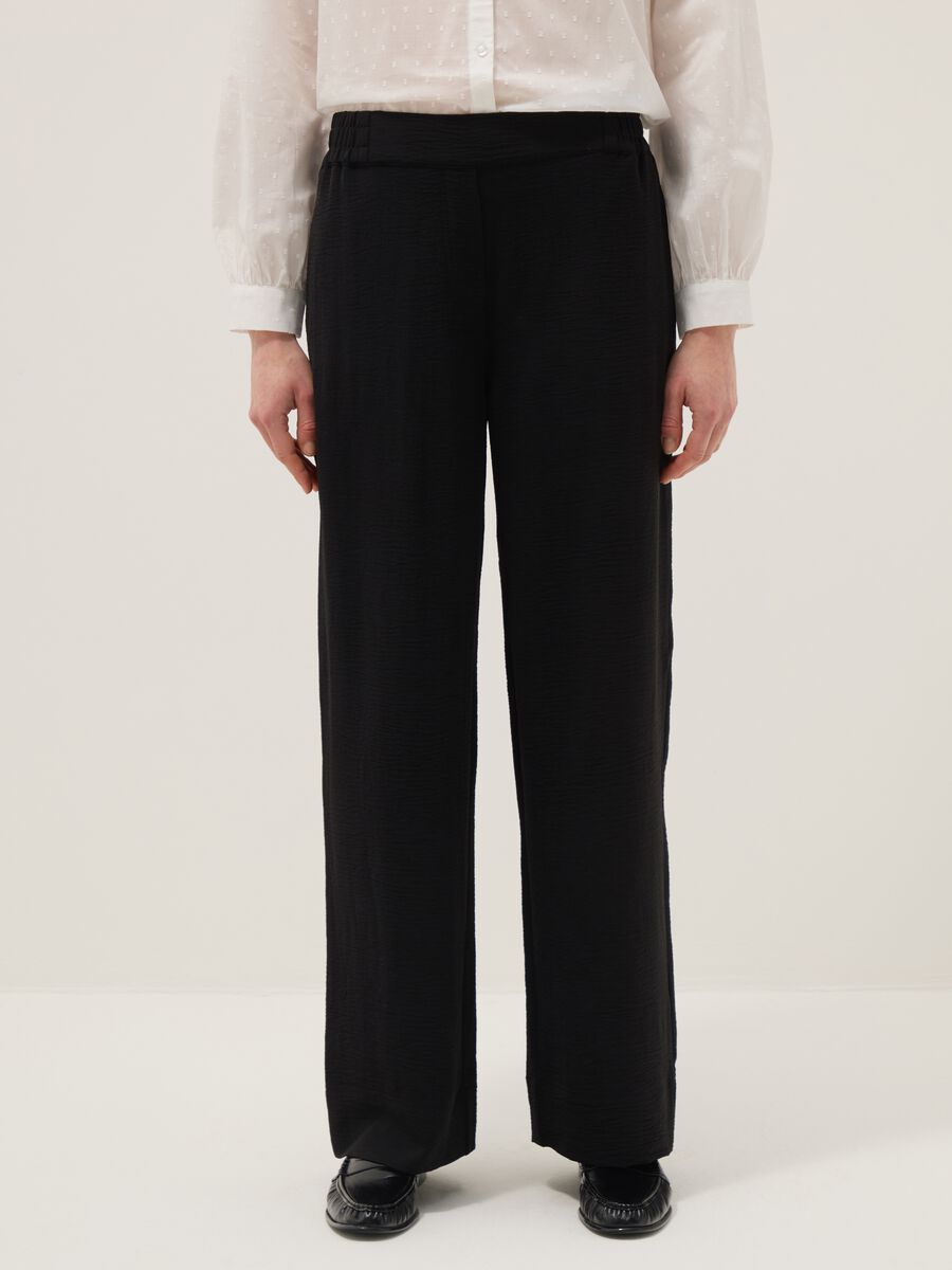 Pantaloni neri con vita elasticizzata wide leg_1