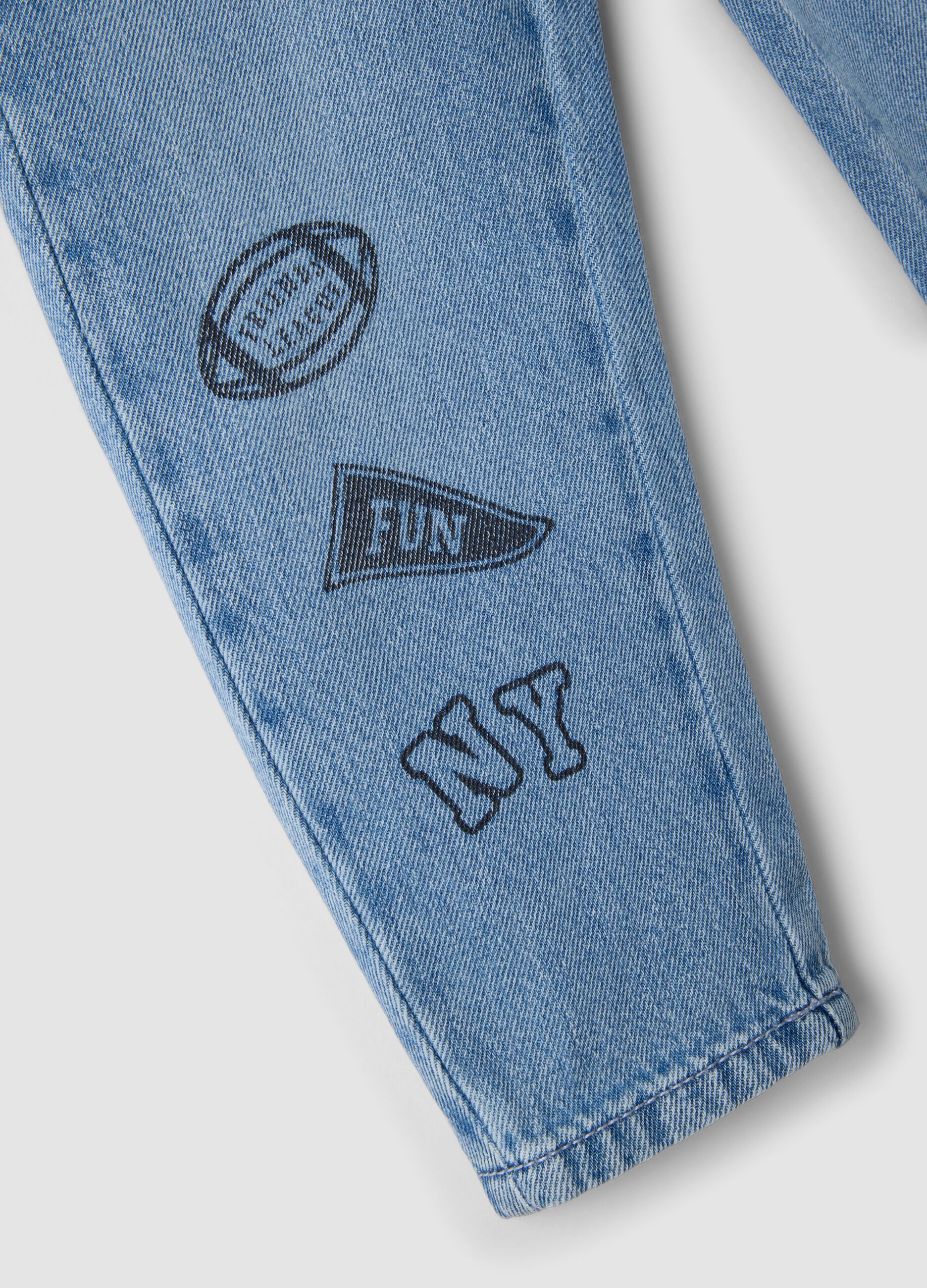 Light blue cotton-viscose blend denim jeans with college-style prints