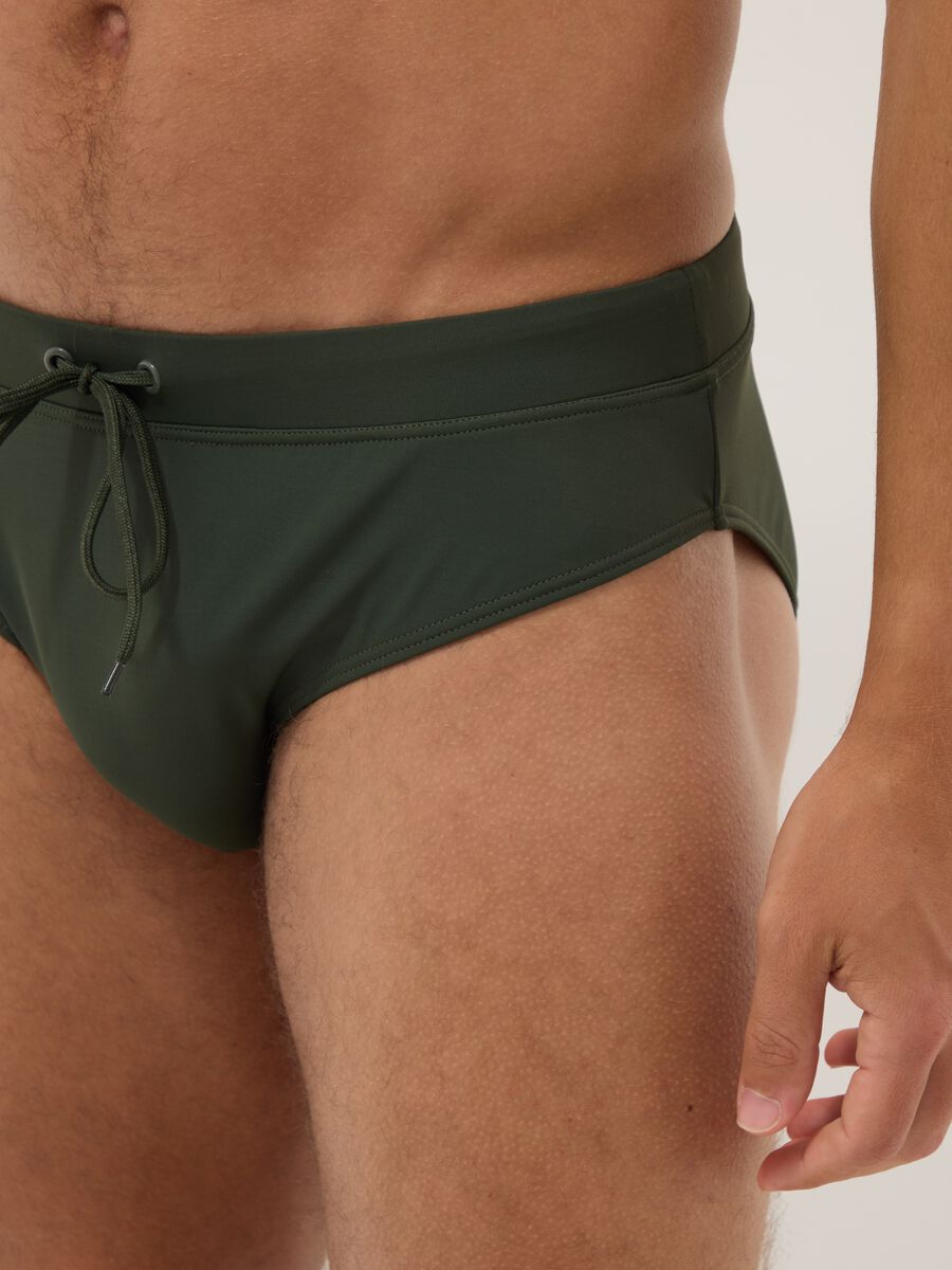 Green stretch fabric swim briefs_3