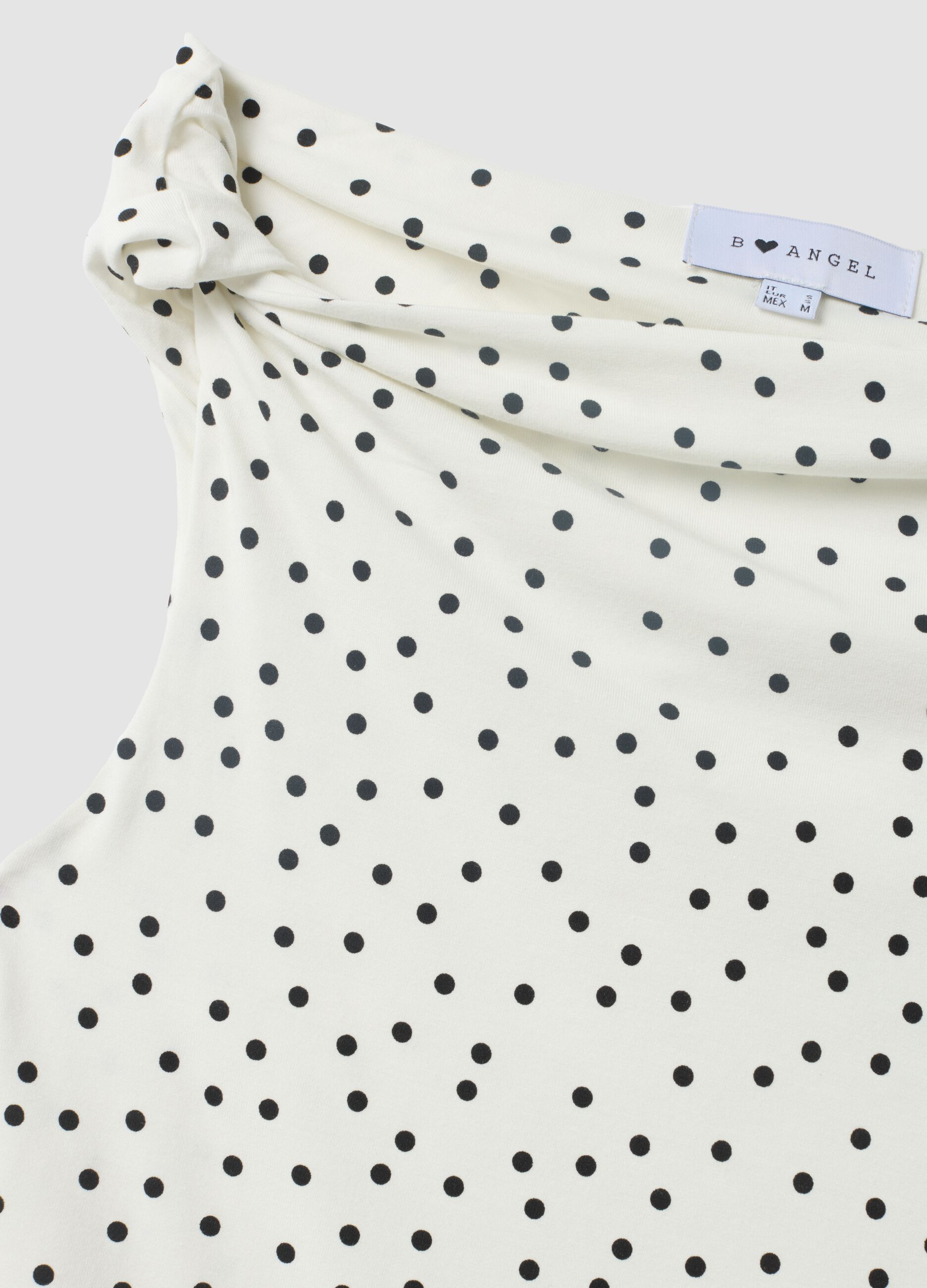 Top bianco asimmetrico monospalla in viscosa elasticizzata a pois slim fit