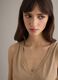 Beige cotton blend regular fit V-neck tank top_0