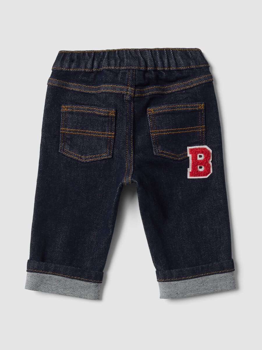 Blue stretch-cotton denim trousers with teddy bear embroidery for baby_1