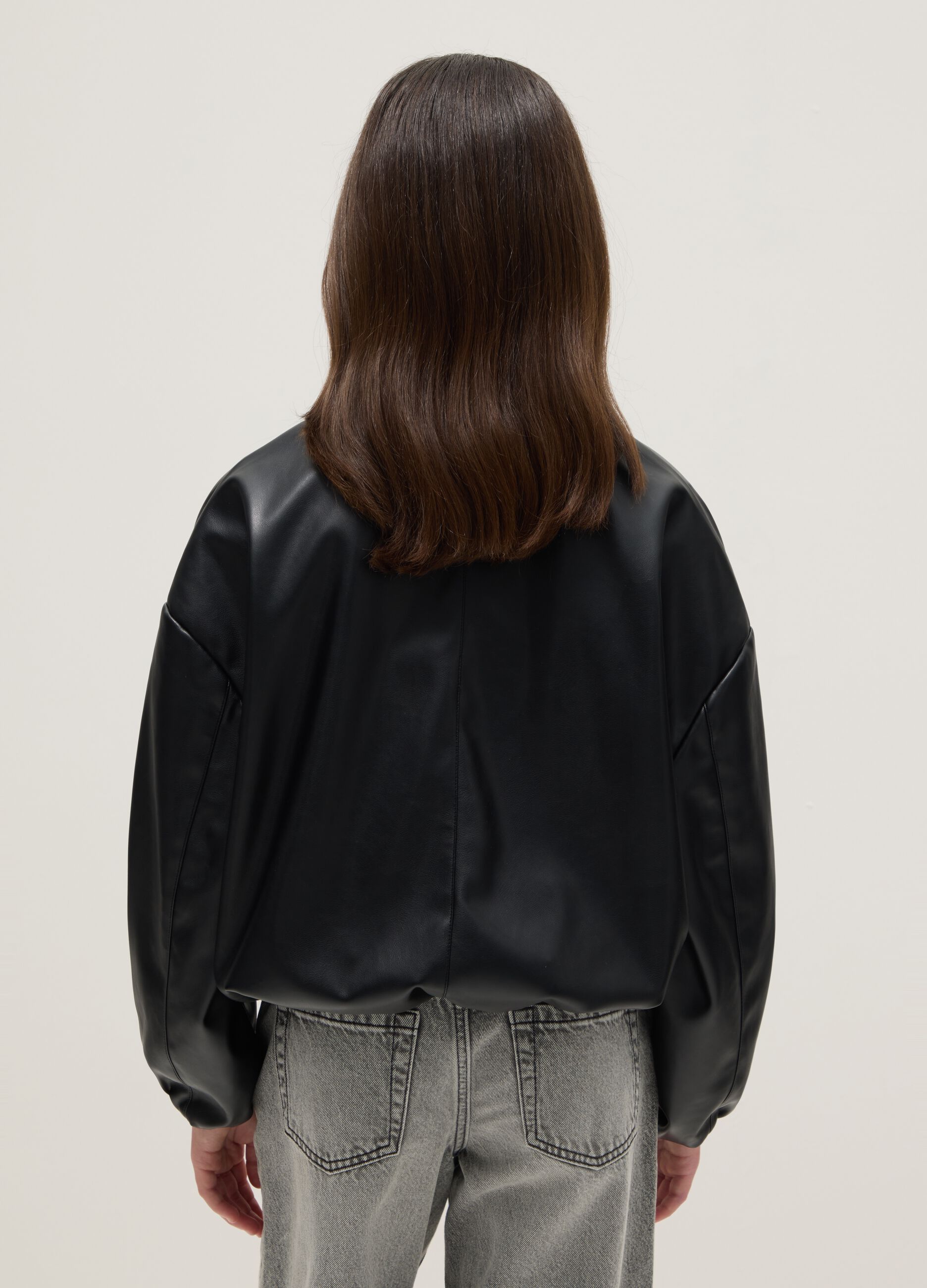 Girls' black bomber jacket with oversized fit
