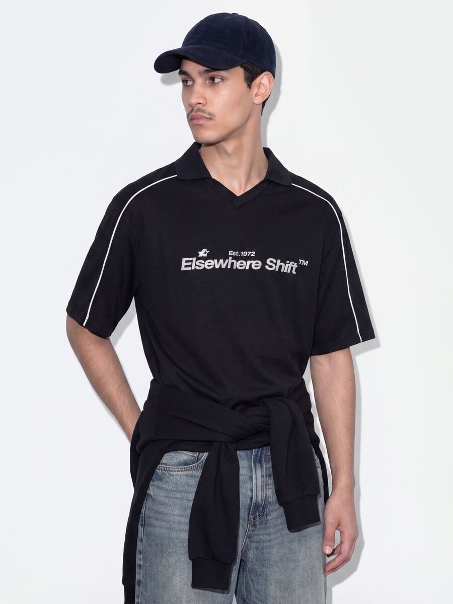 Polo nera in puro cotone over fit a maniche corte over fit_0