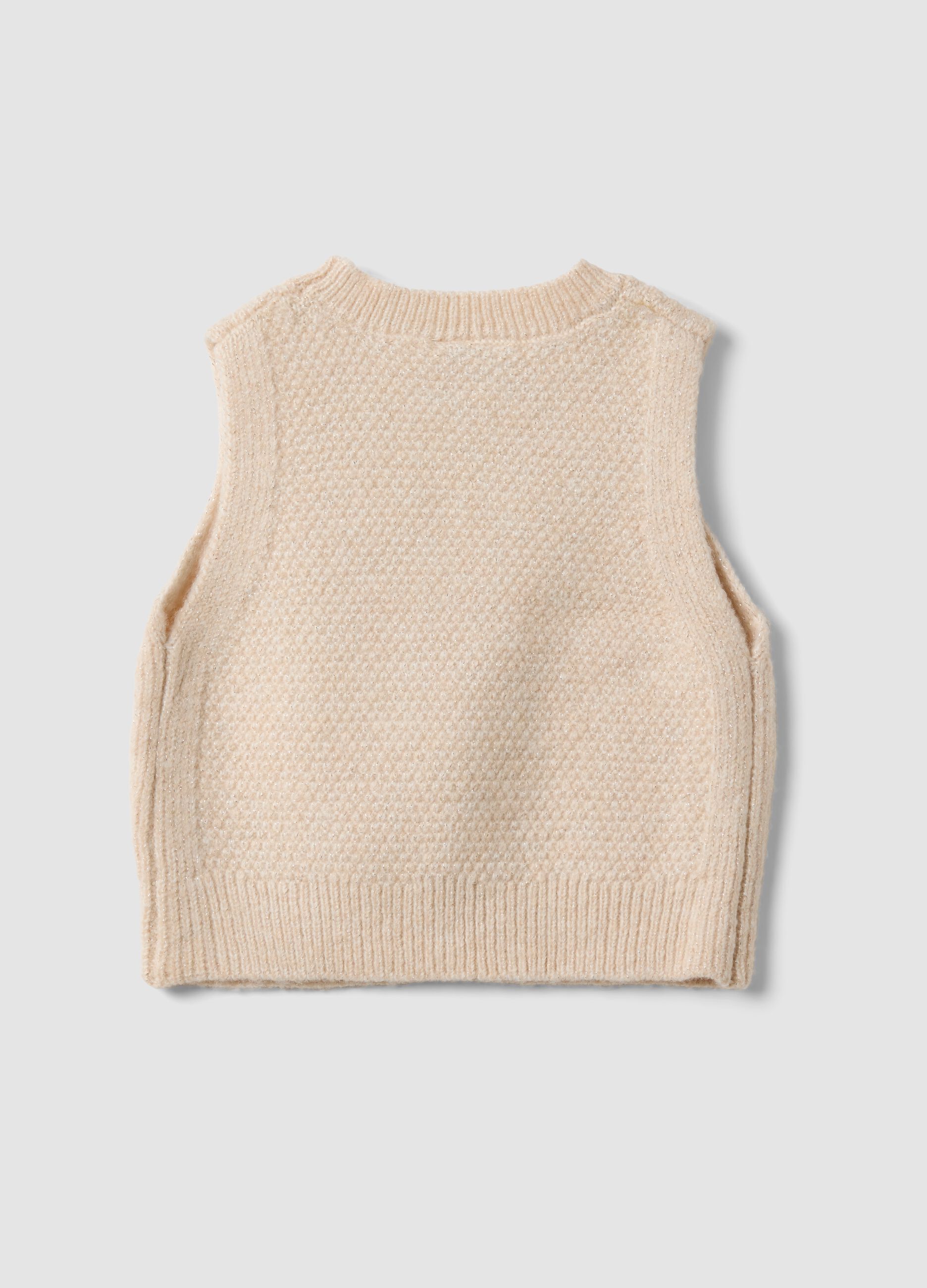 White knitted gilet with raised pattern for baby girl