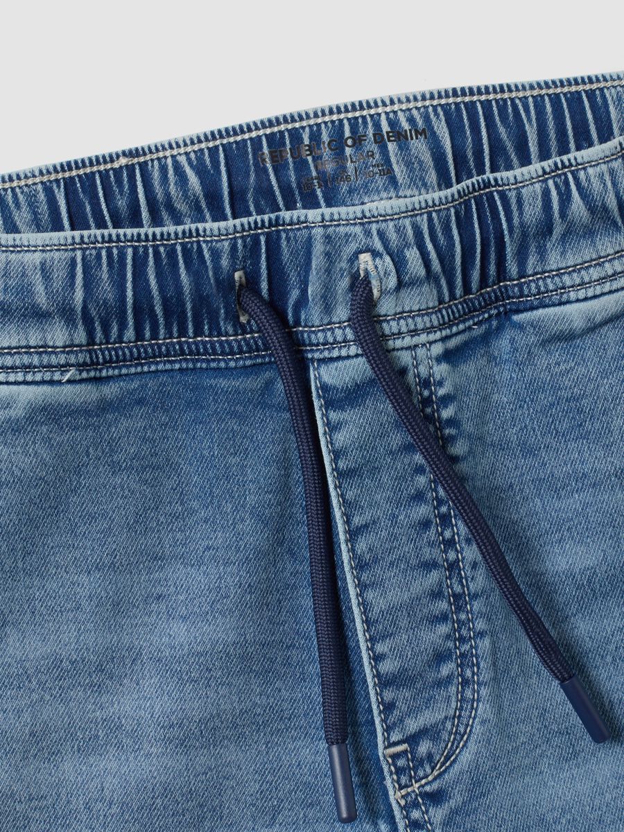 Blue stretch-cotton jogger jeans with drawstring for boys_1