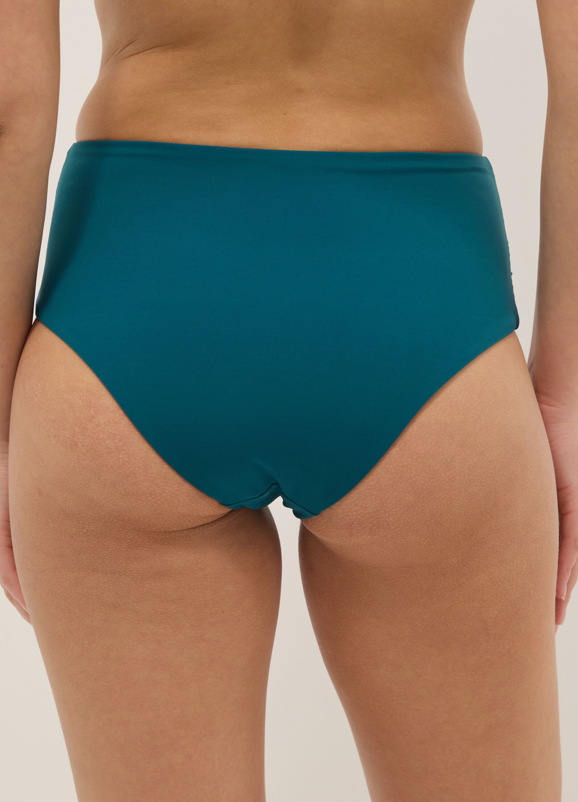 Green bikini bottoms with centre knot in stretchy shaping fabric