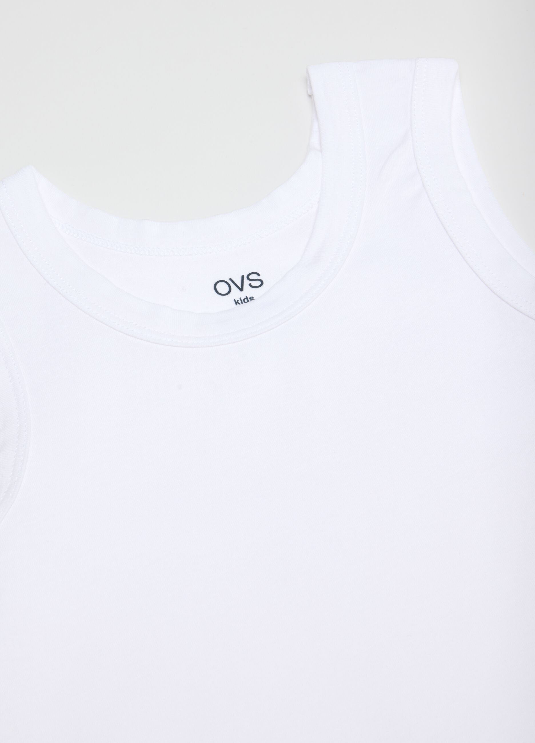 Twin pack of boys' white stretch cotton vests in regular fit