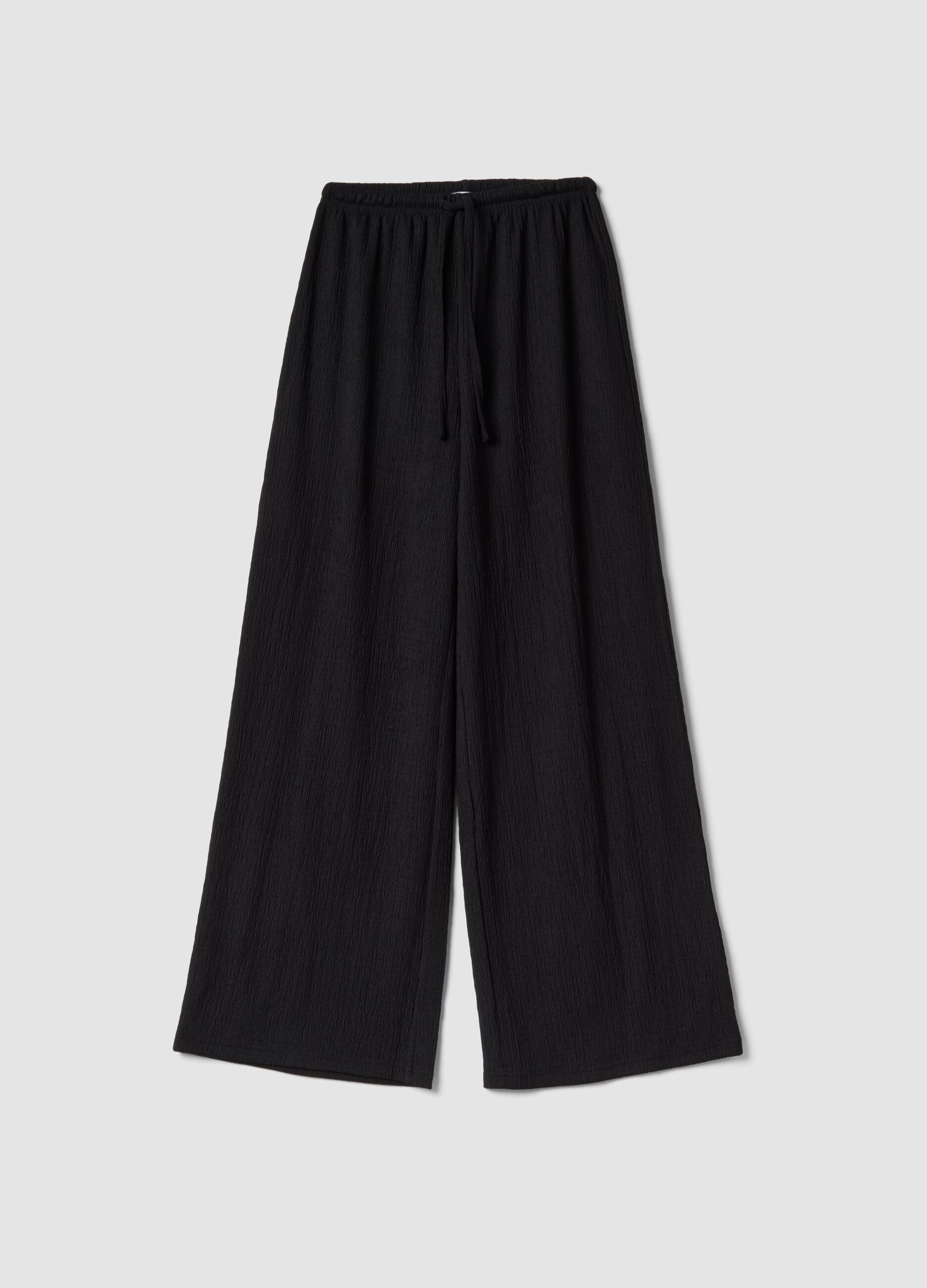 Black wide-leg jogger trousers