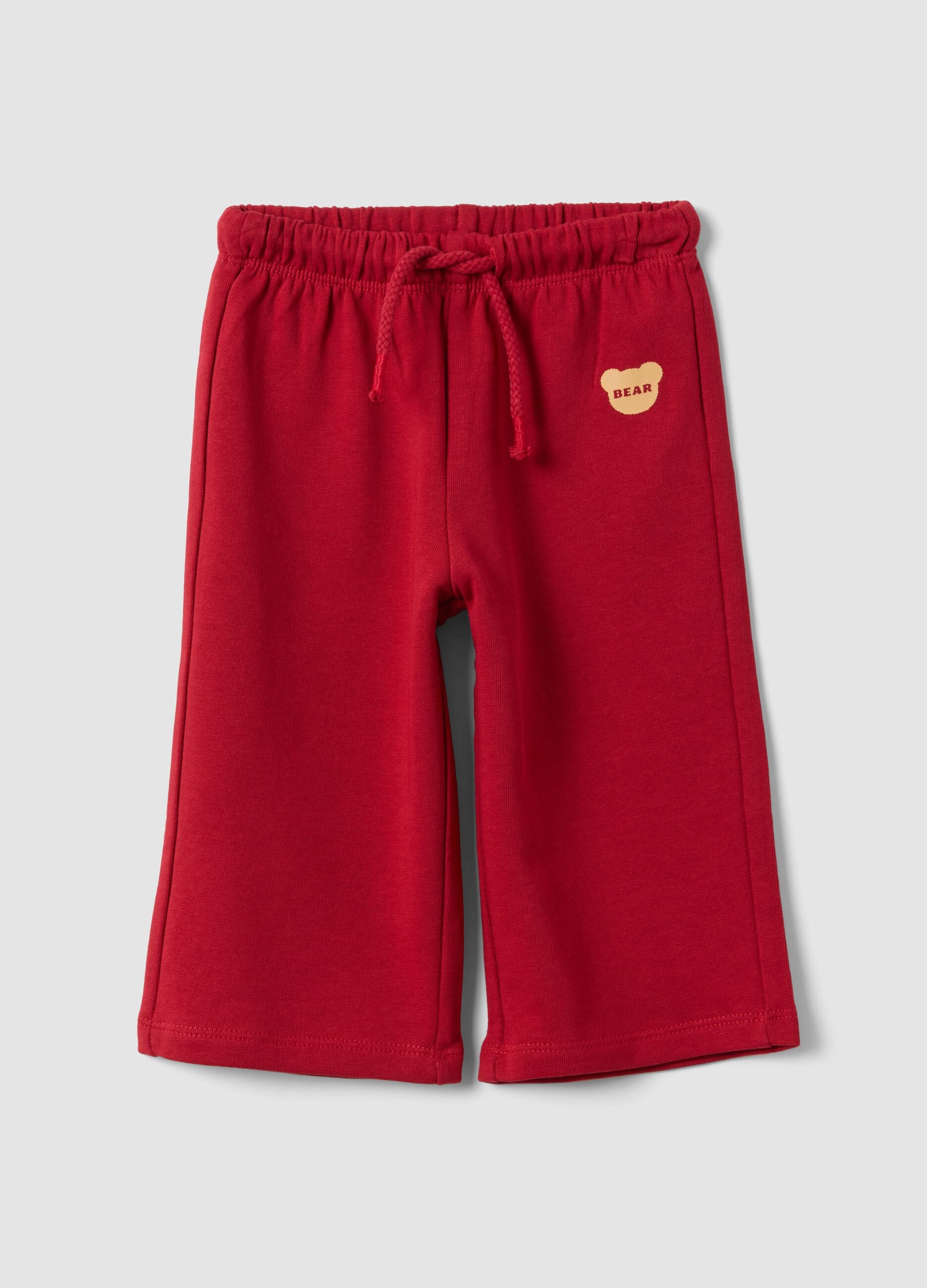 Red pure cotton trousers with elasticated waist and print for baby girls