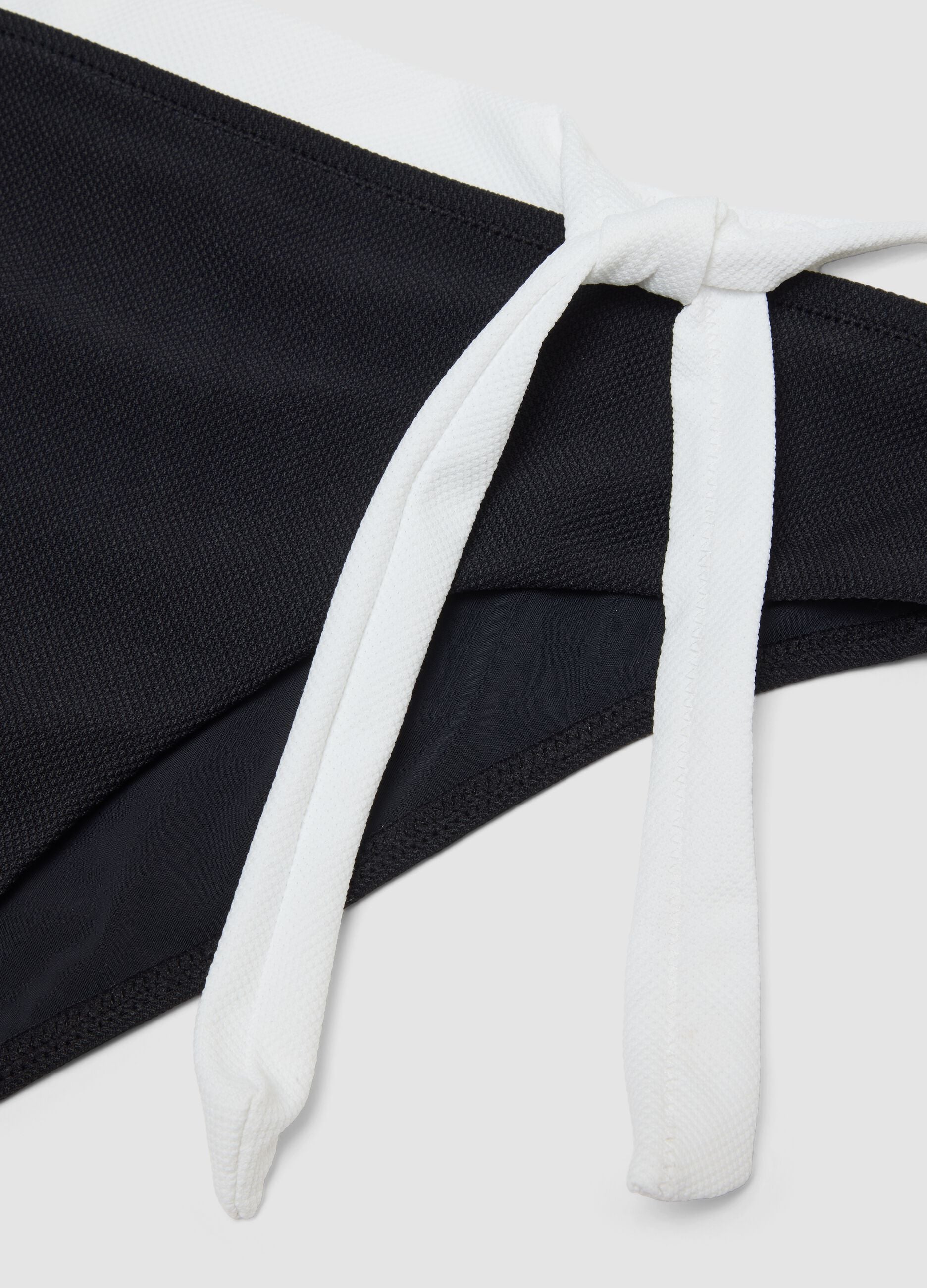 Black stretch bikini bottoms with white drawstring