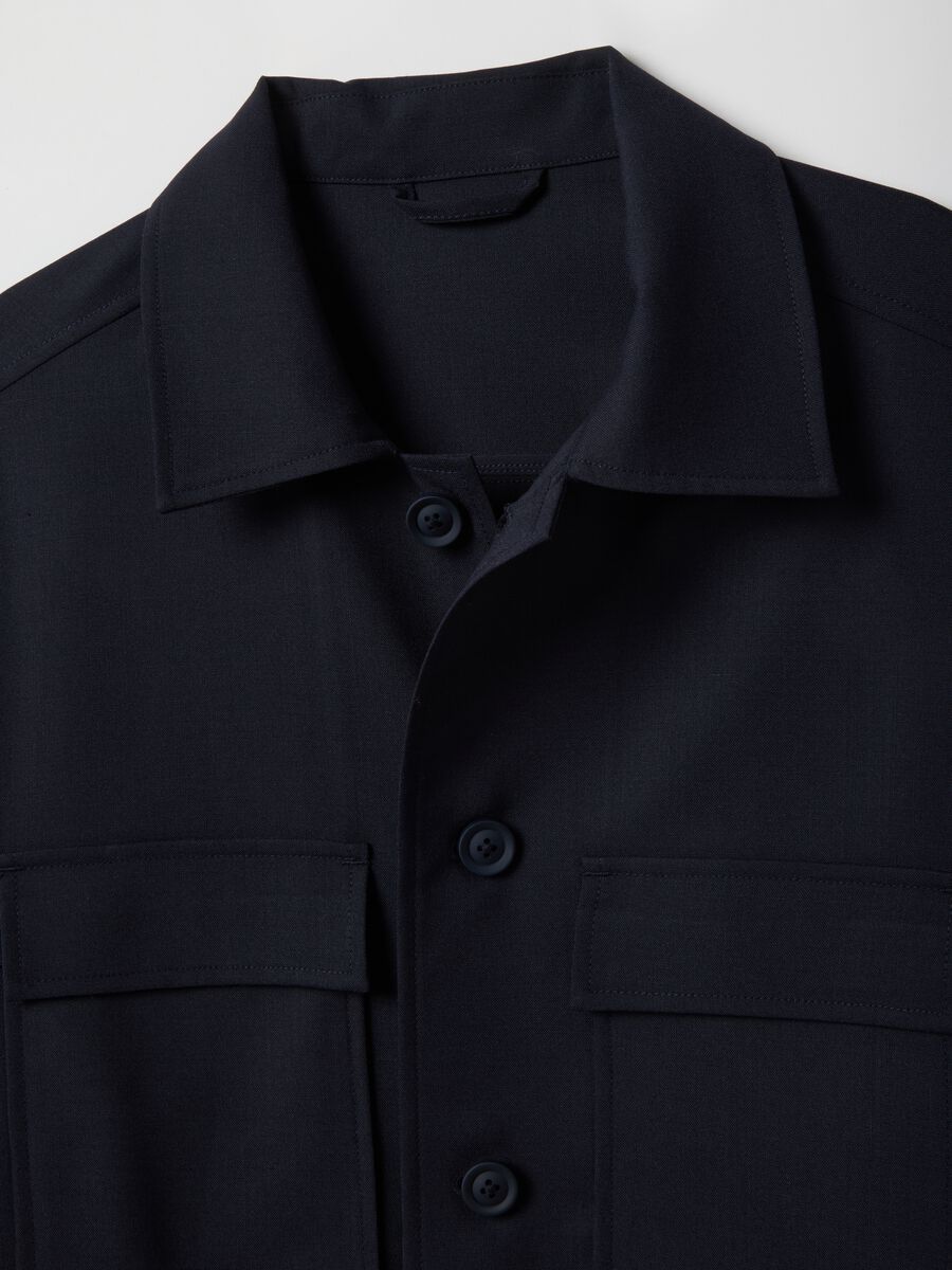 Light blue regular fit jacket with buttons and front pockets_5
