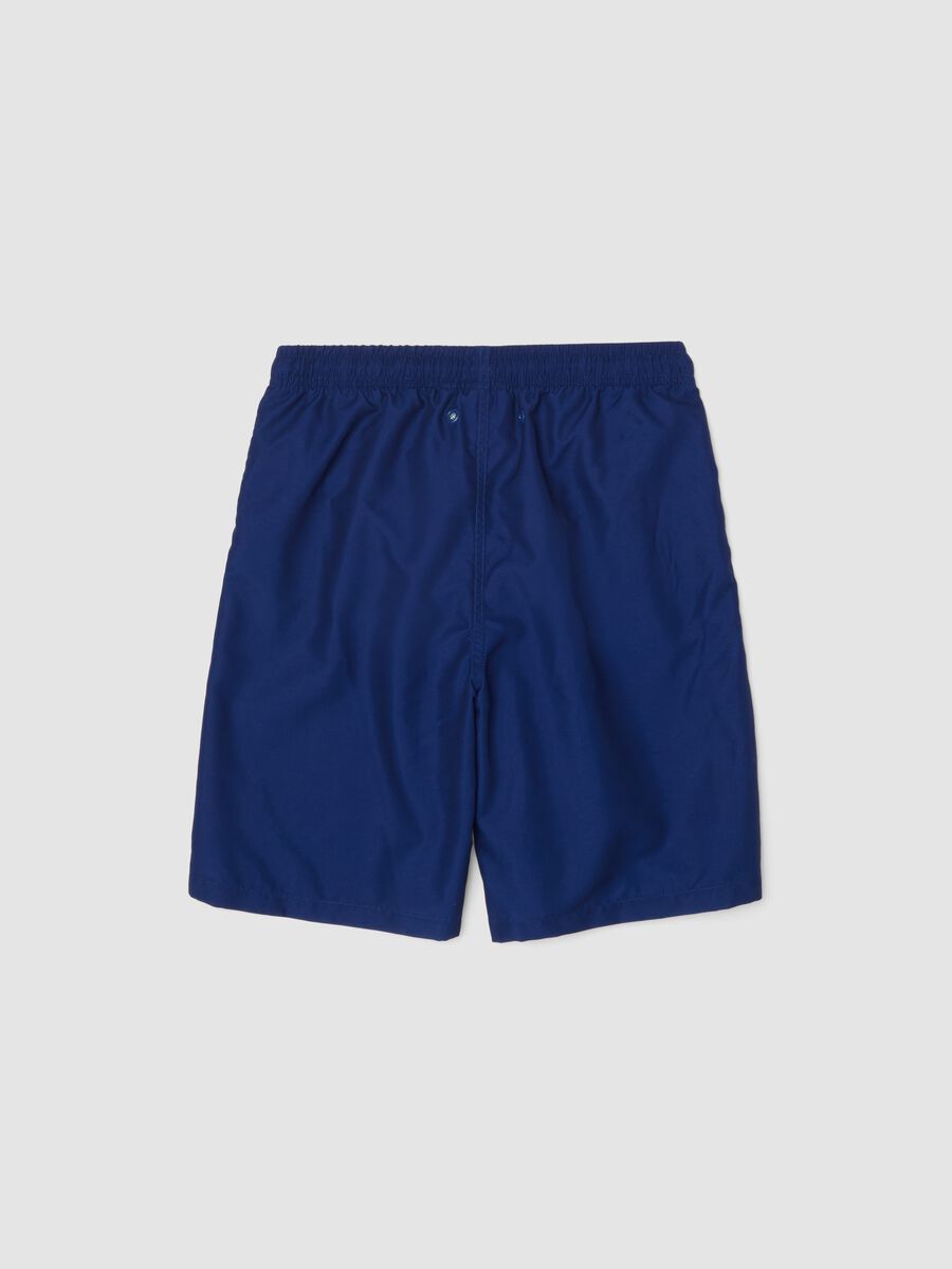 Blue regular fit swim trunks with Super Mario print_1
