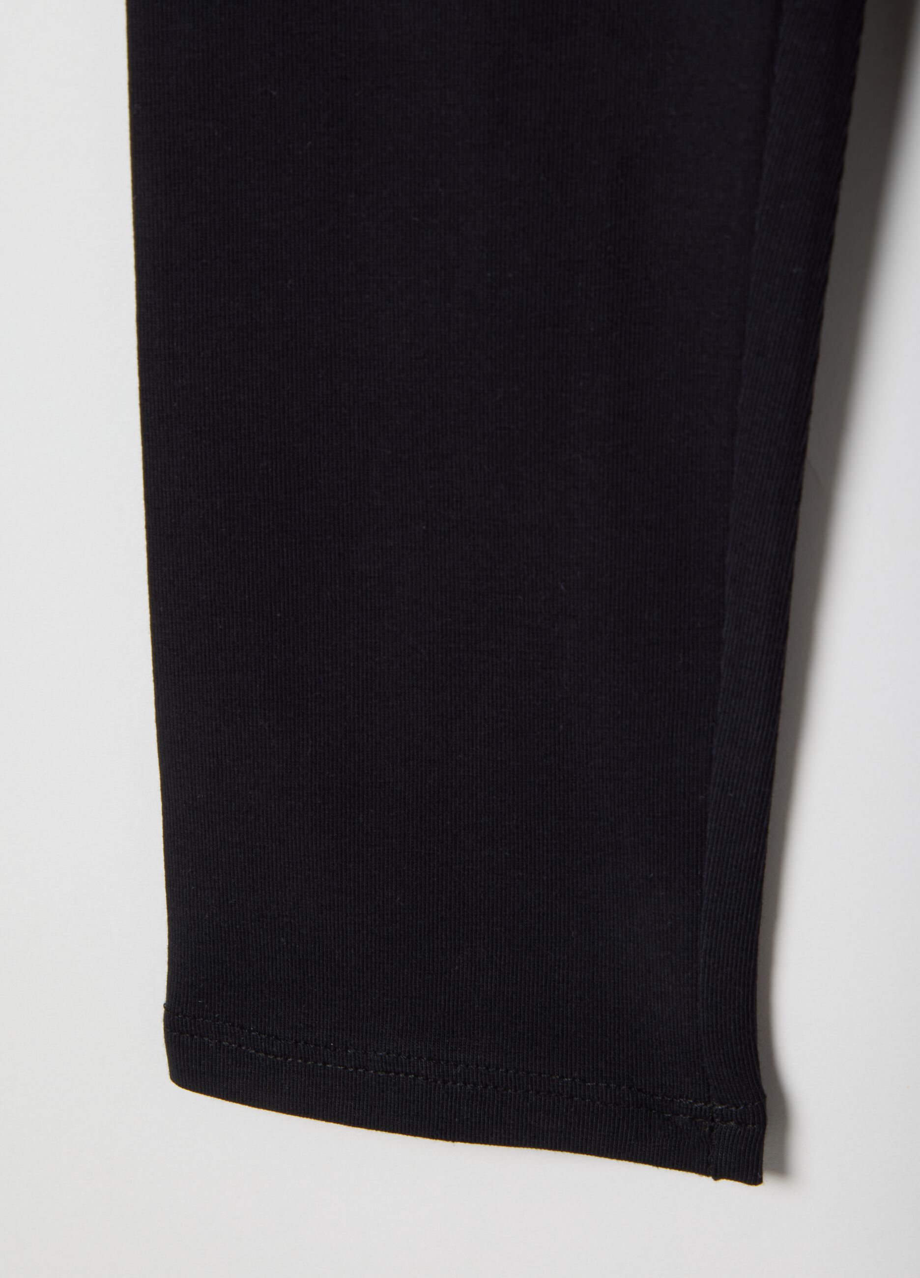 Girls' black stretchy cotton leggings slim fit with star