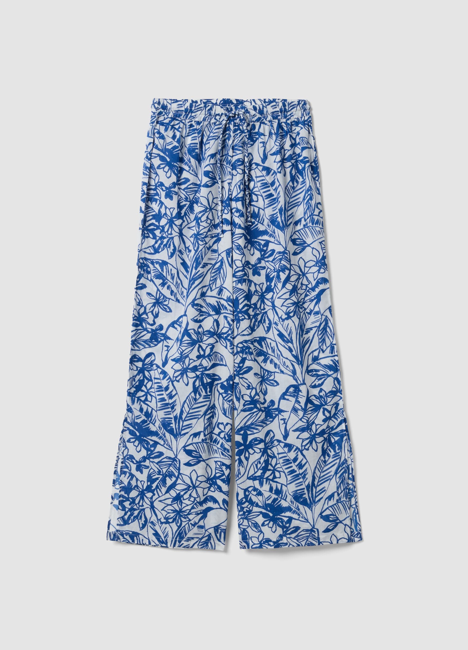 Blue and white organic cotton trousers with floral print