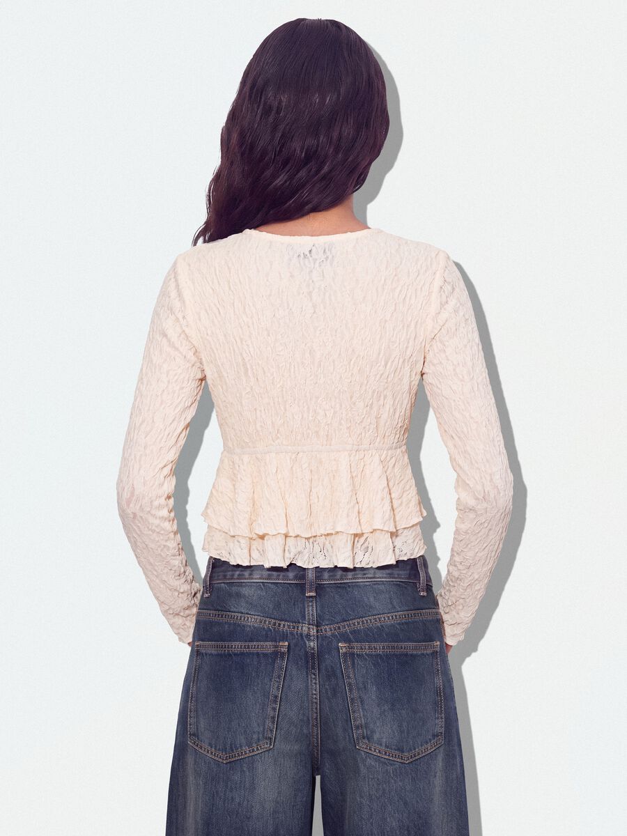 White stretch top with deep V-neck and ruffle trim_2