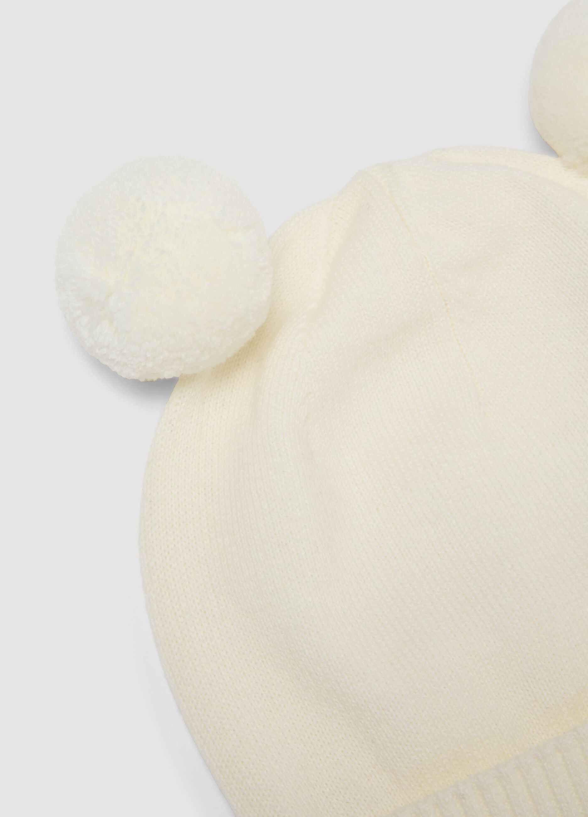 White pure organic cotton knitted baby hat with pom‑poms