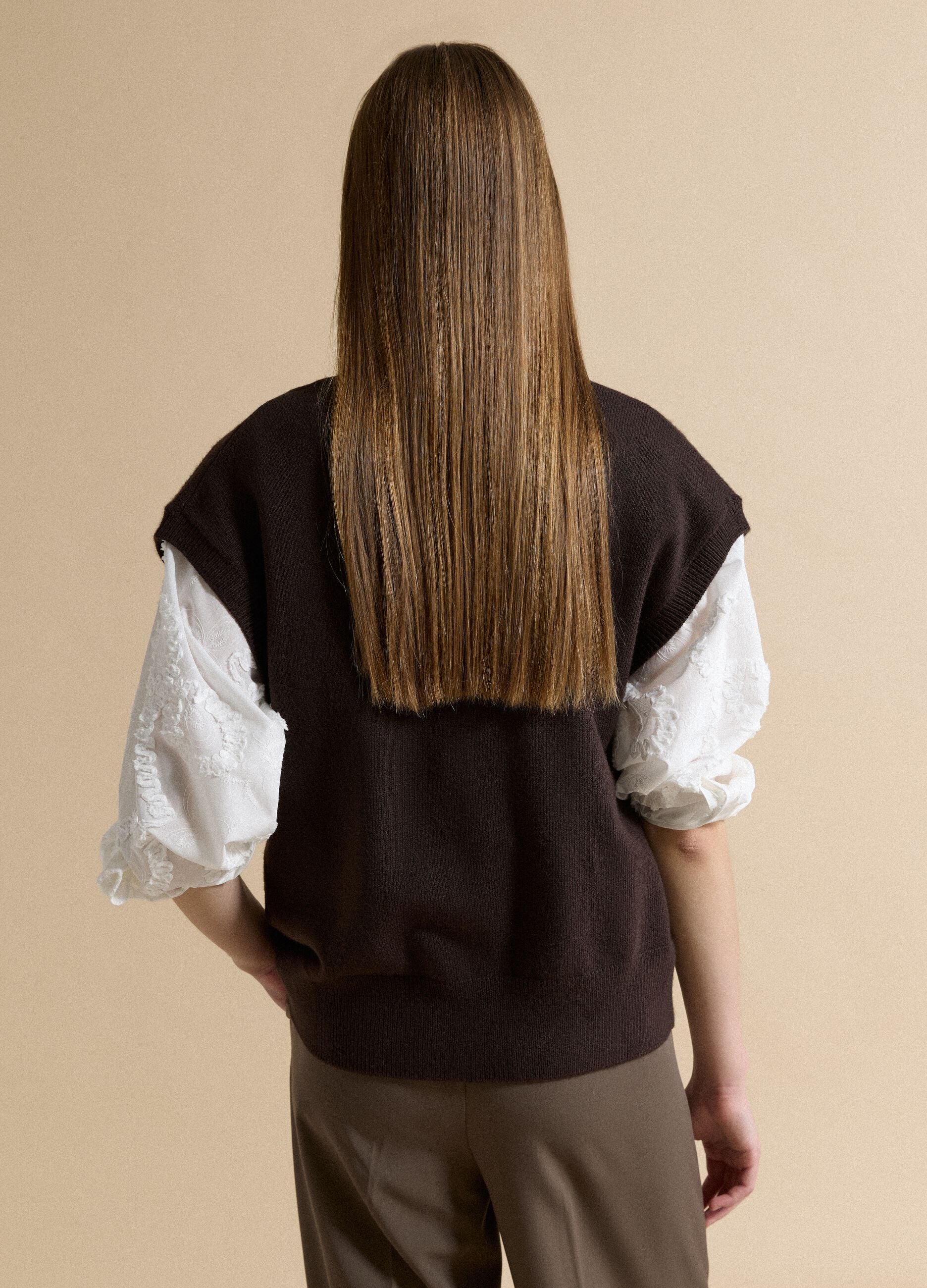 Brown V-neck button-up vest with oversized fit