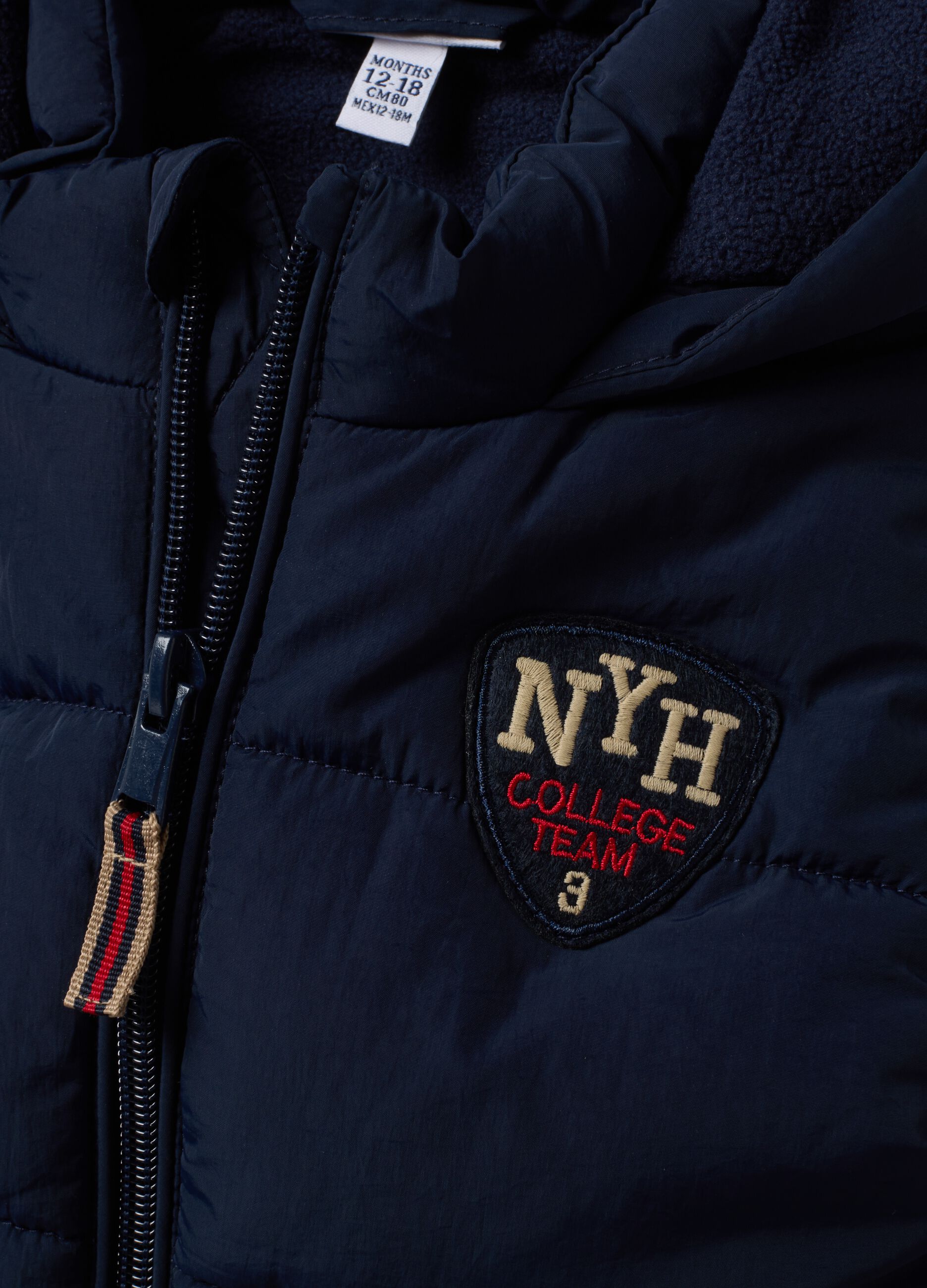 Gilet blu imbottito con cappuccio e zip per bimbo
