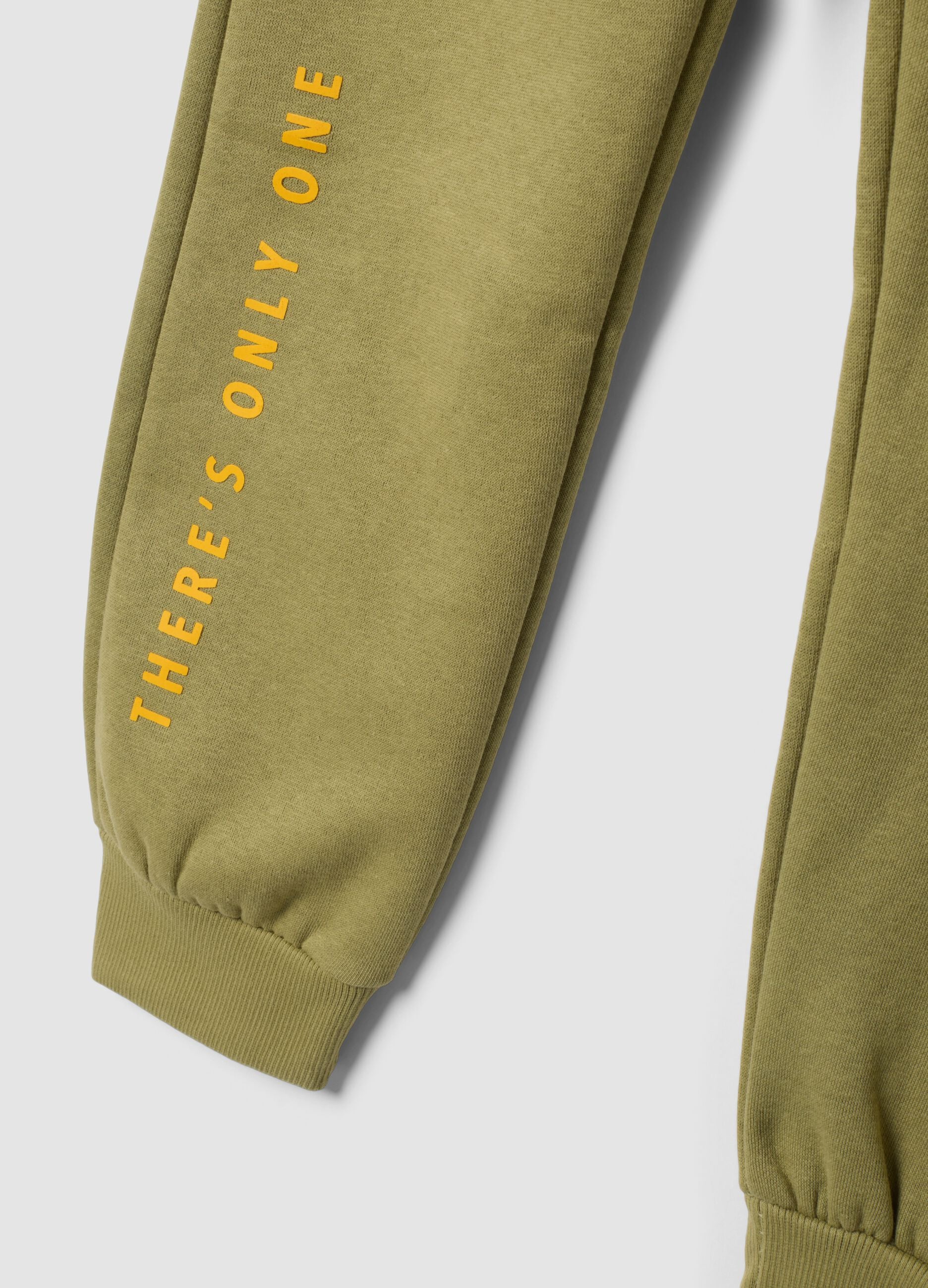 Green cotton-blend trousers with cuffed hems
