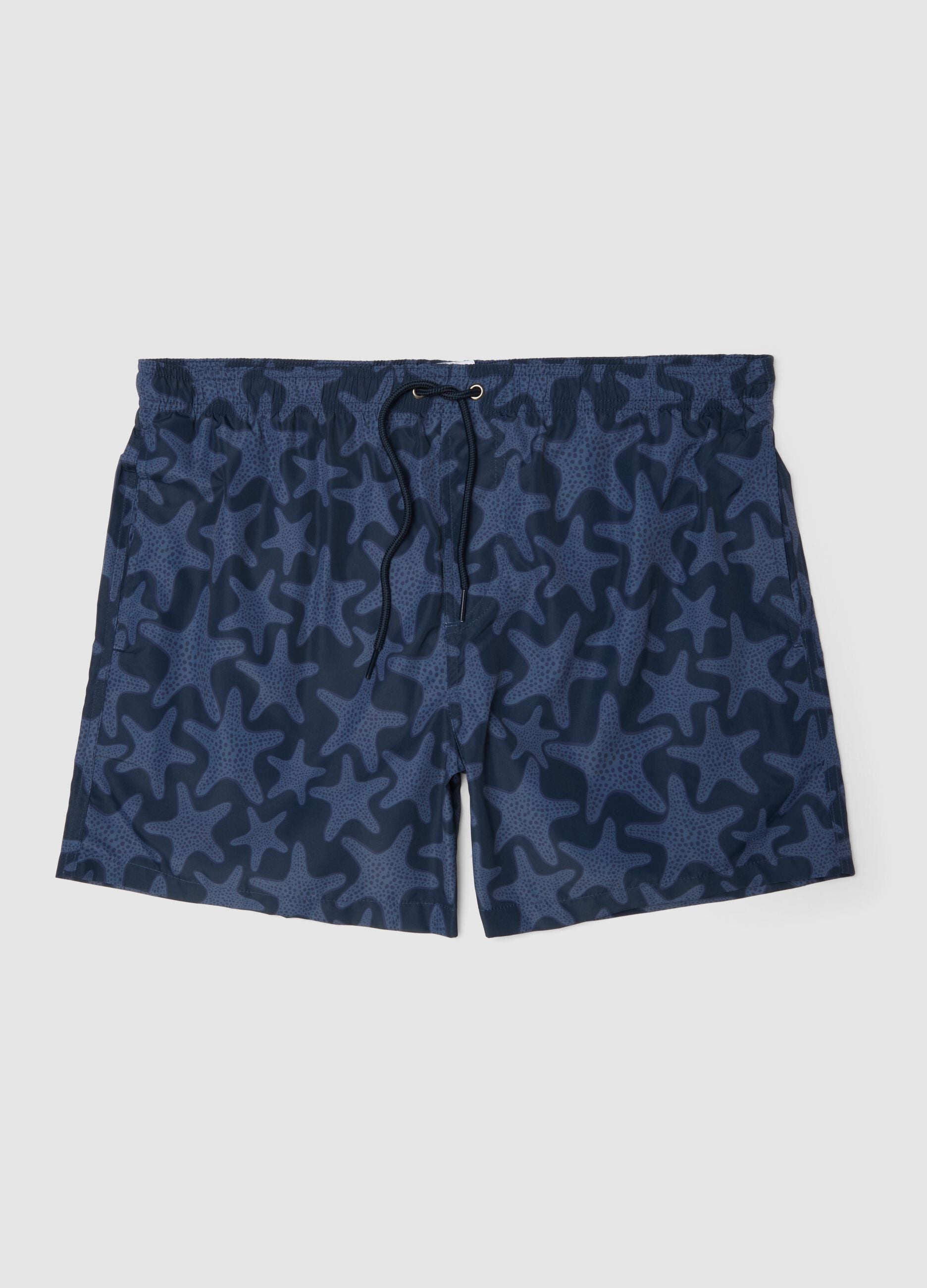 Blue swim shorts with starfish print