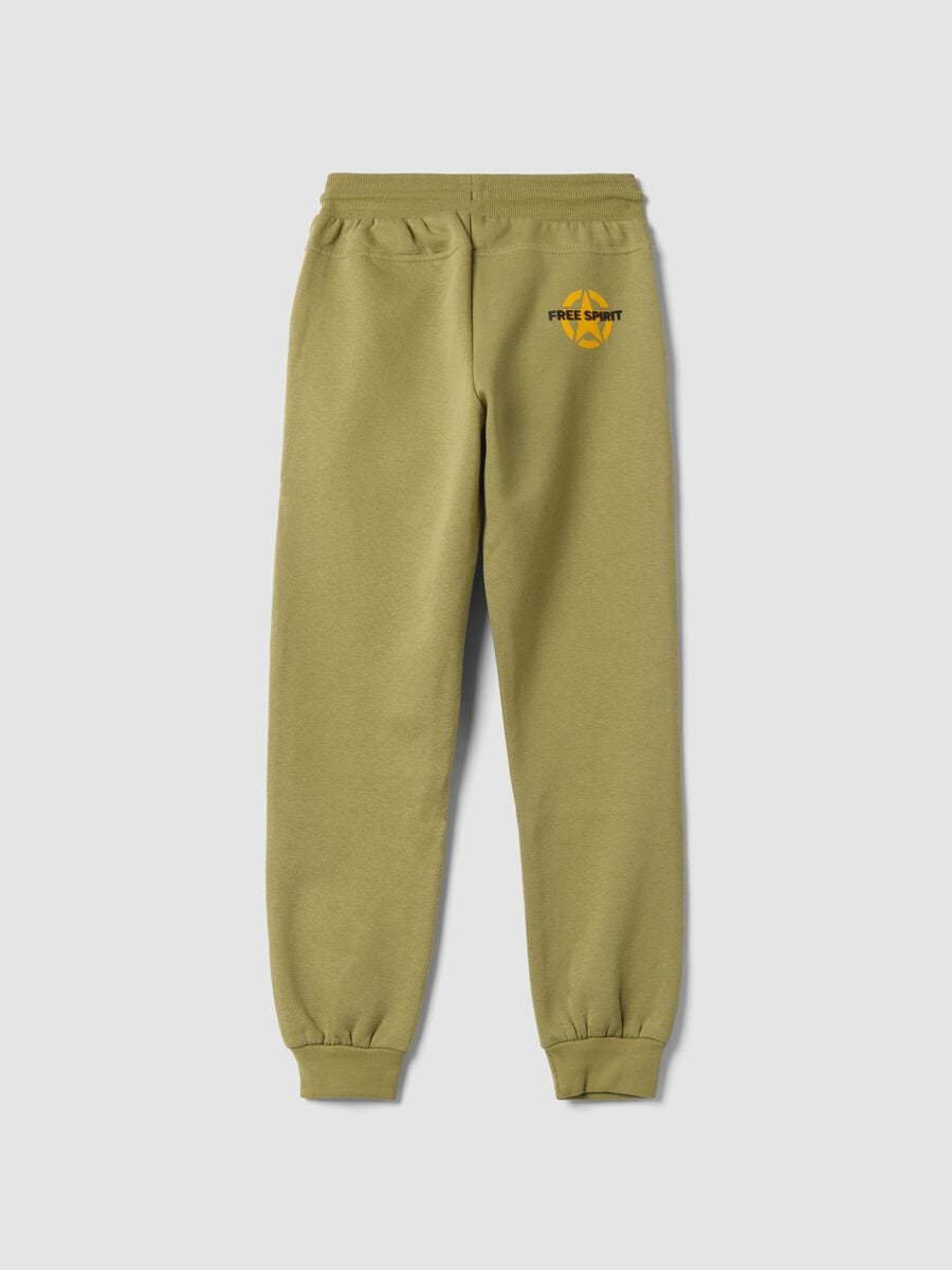 Green cotton-blend trousers with cuffed hems_1