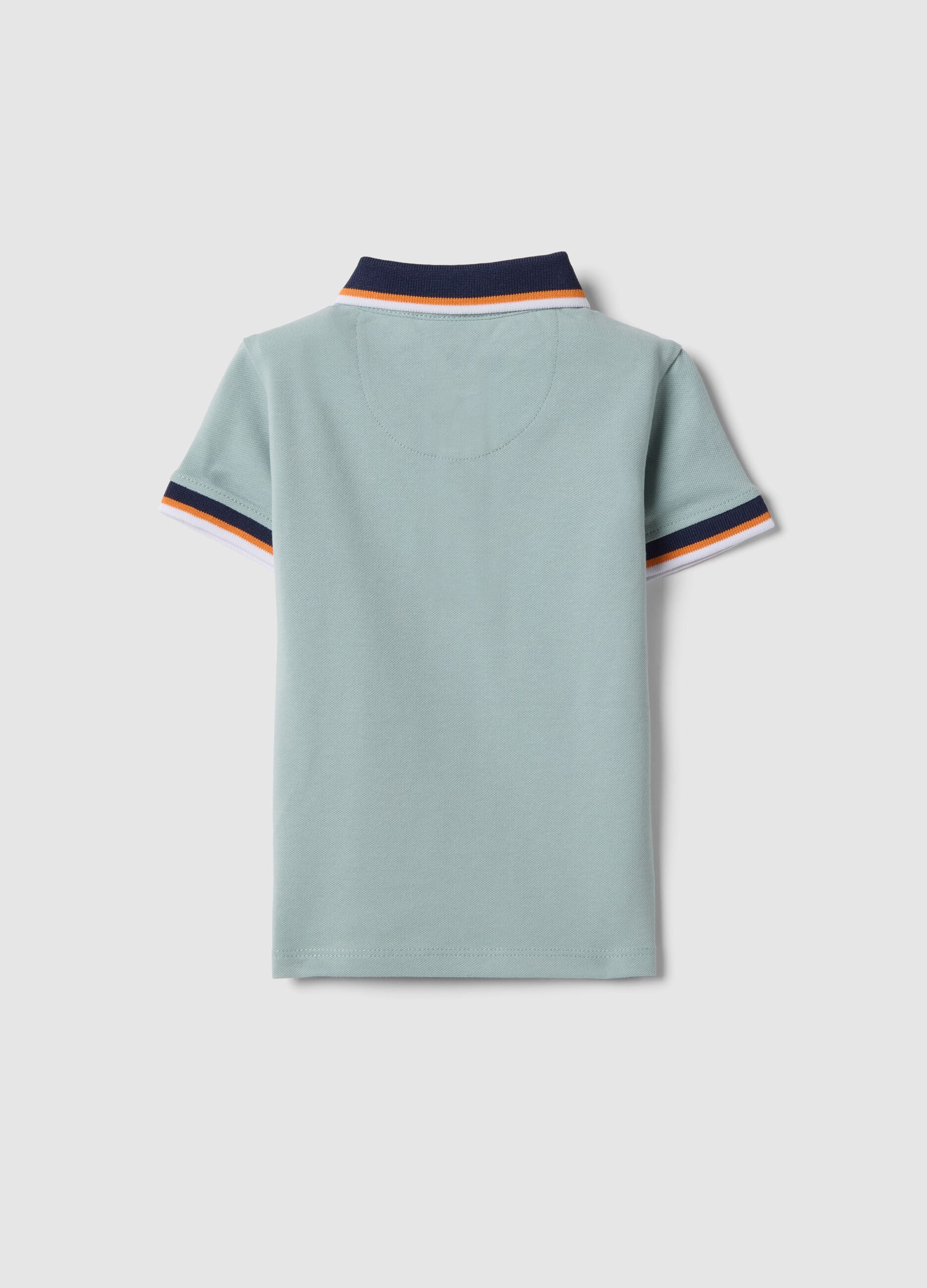 Regular fit boys' light blue stretch cotton polo with embroidery