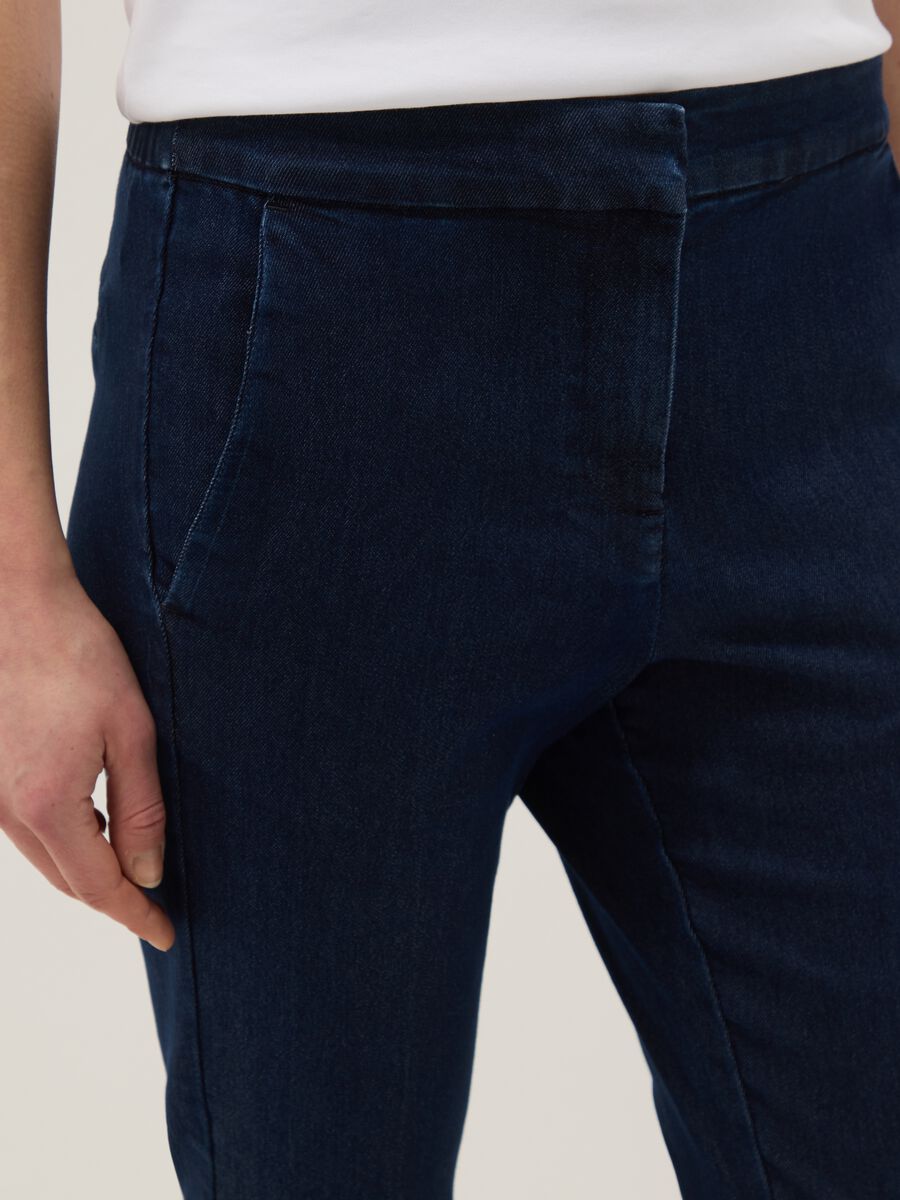 Blue slim fit stretch denim cotton blend trousers_3