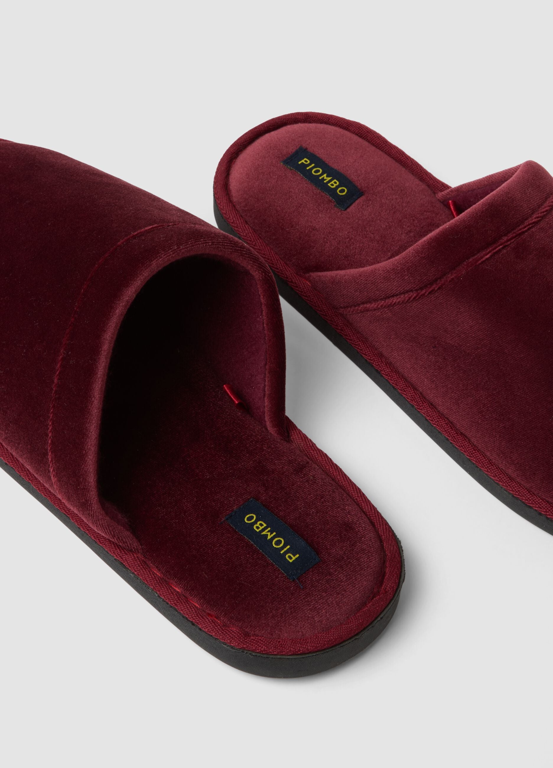 Red lined slippers for home wear