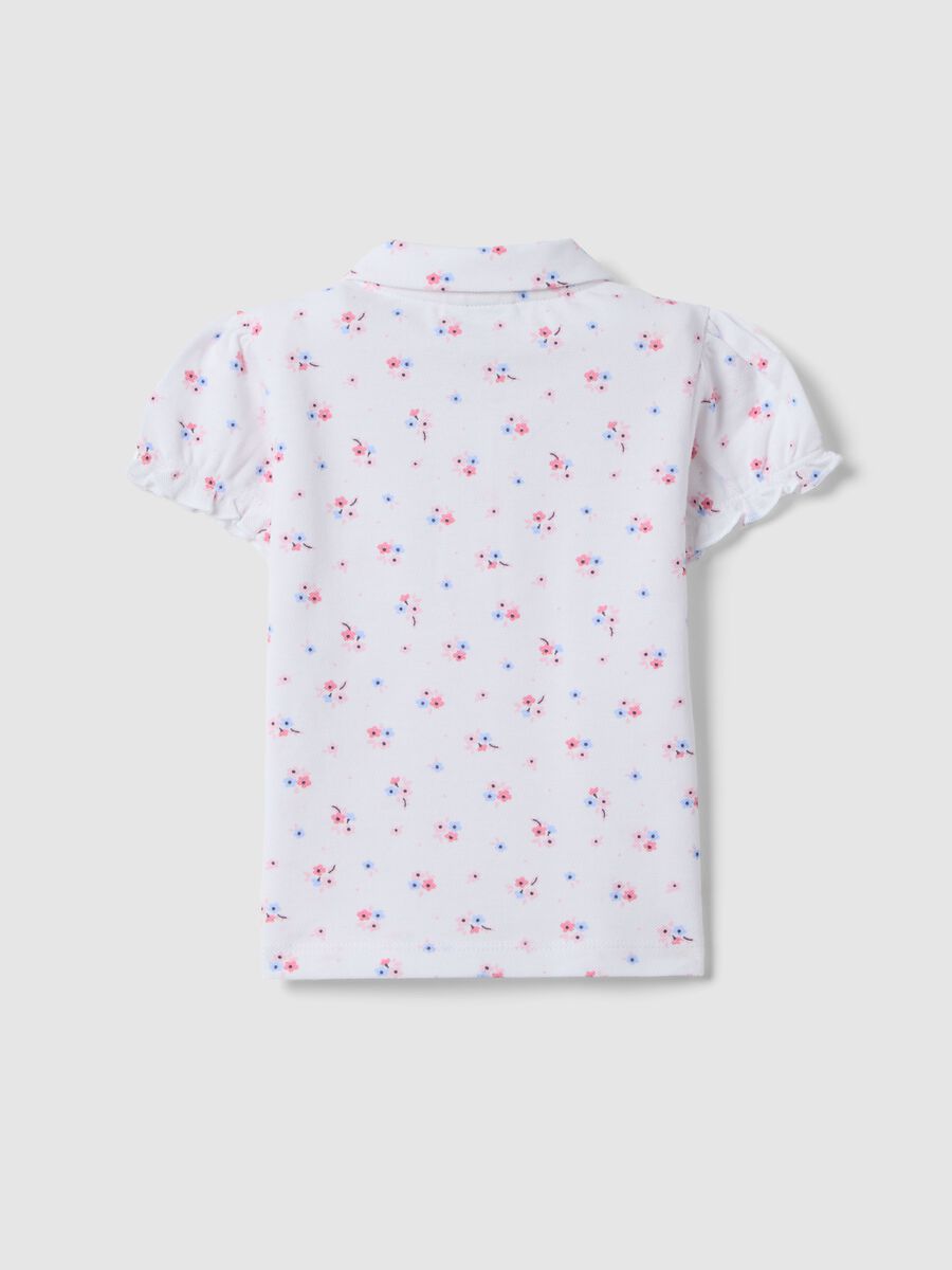 Polo in puro cotone bianca da bimba regular fit con motivo floreale_1