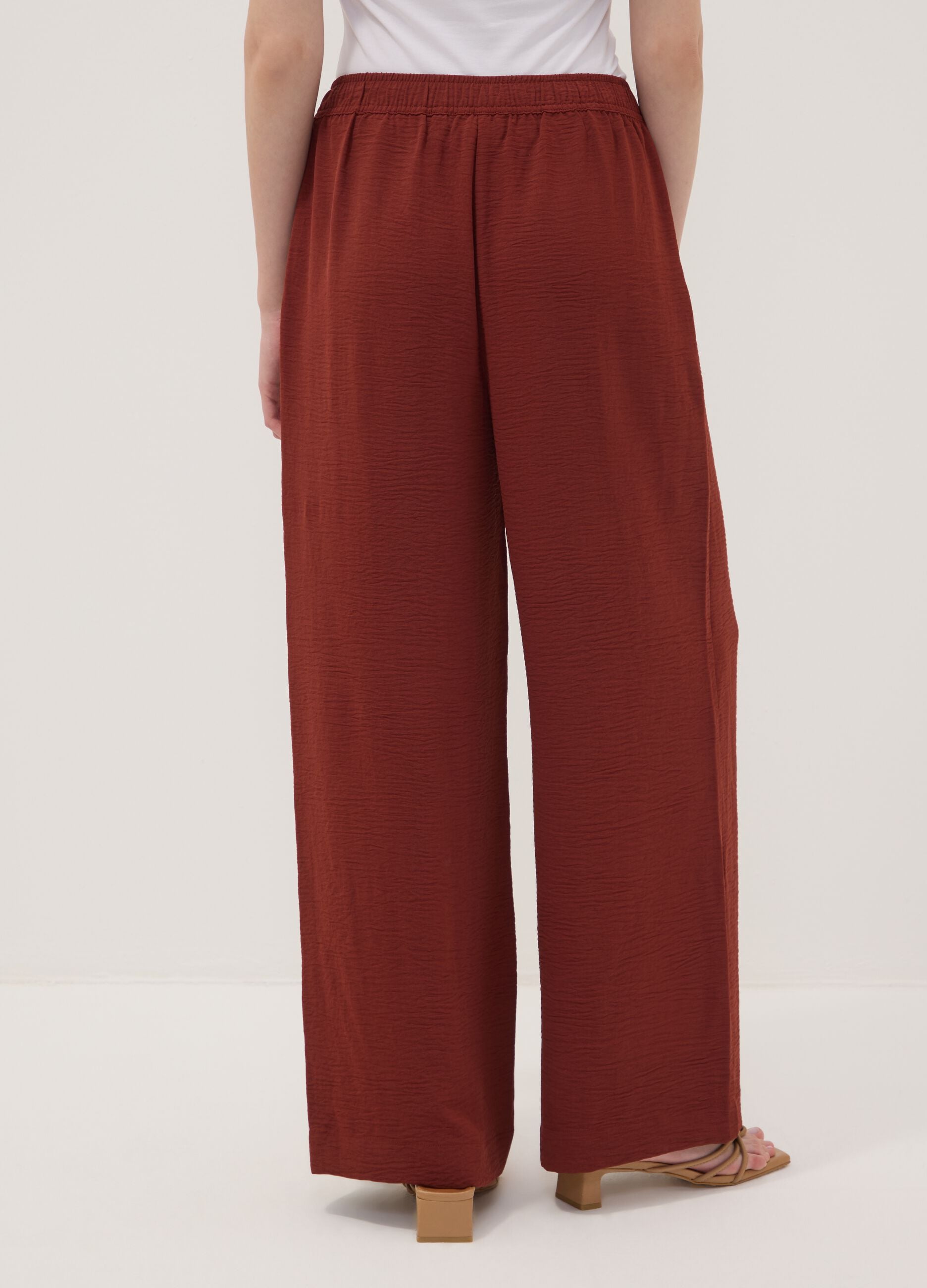 Red wide-leg trousers with elasticated waistband