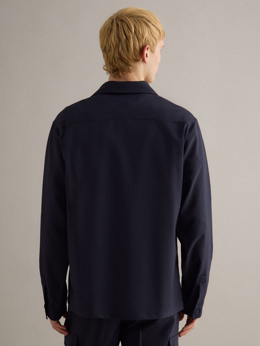 Light blue regular fit jacket with buttons and front pockets_3