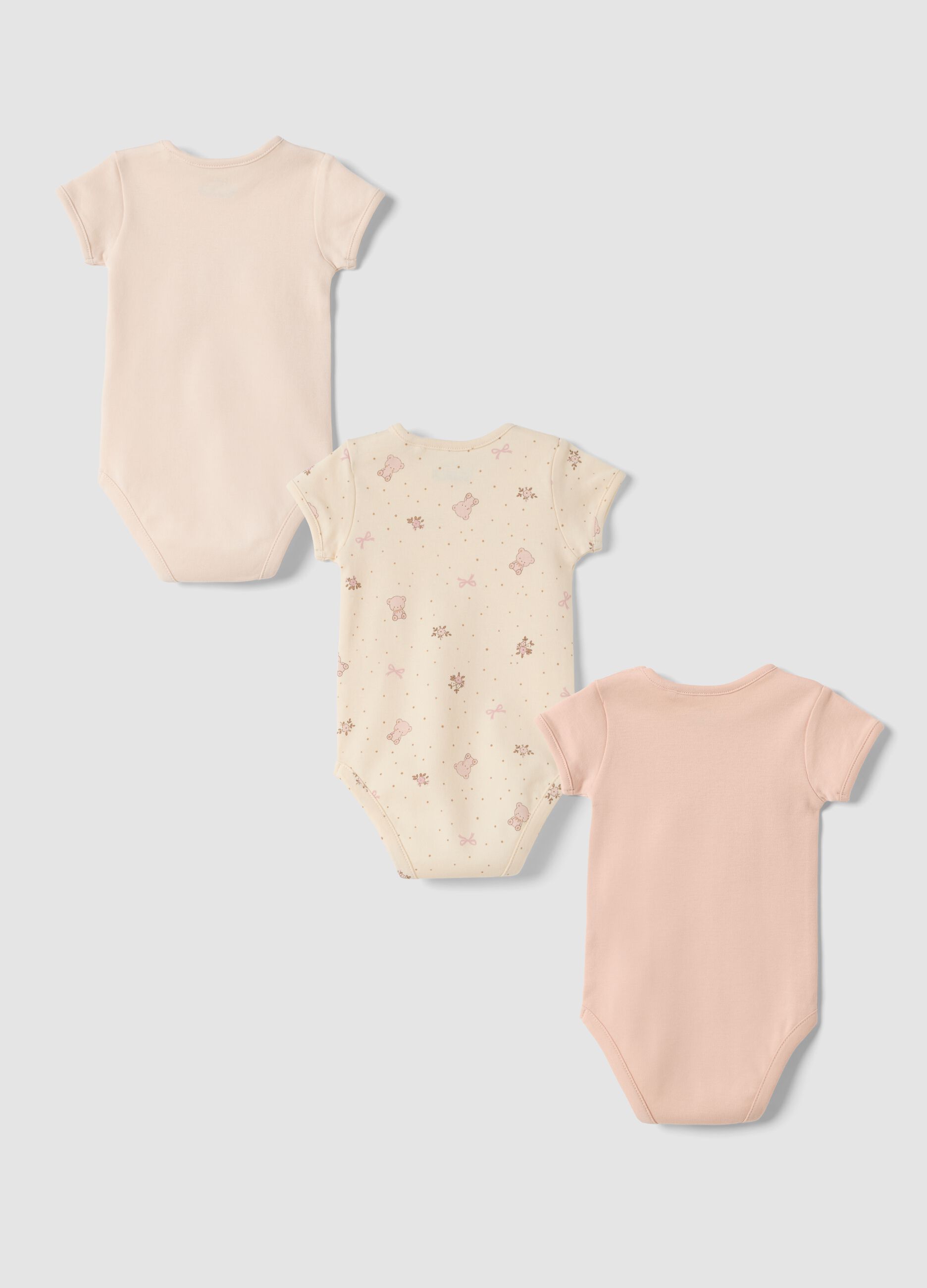 3-pack pink and beige organic cotton bodysuits with print
