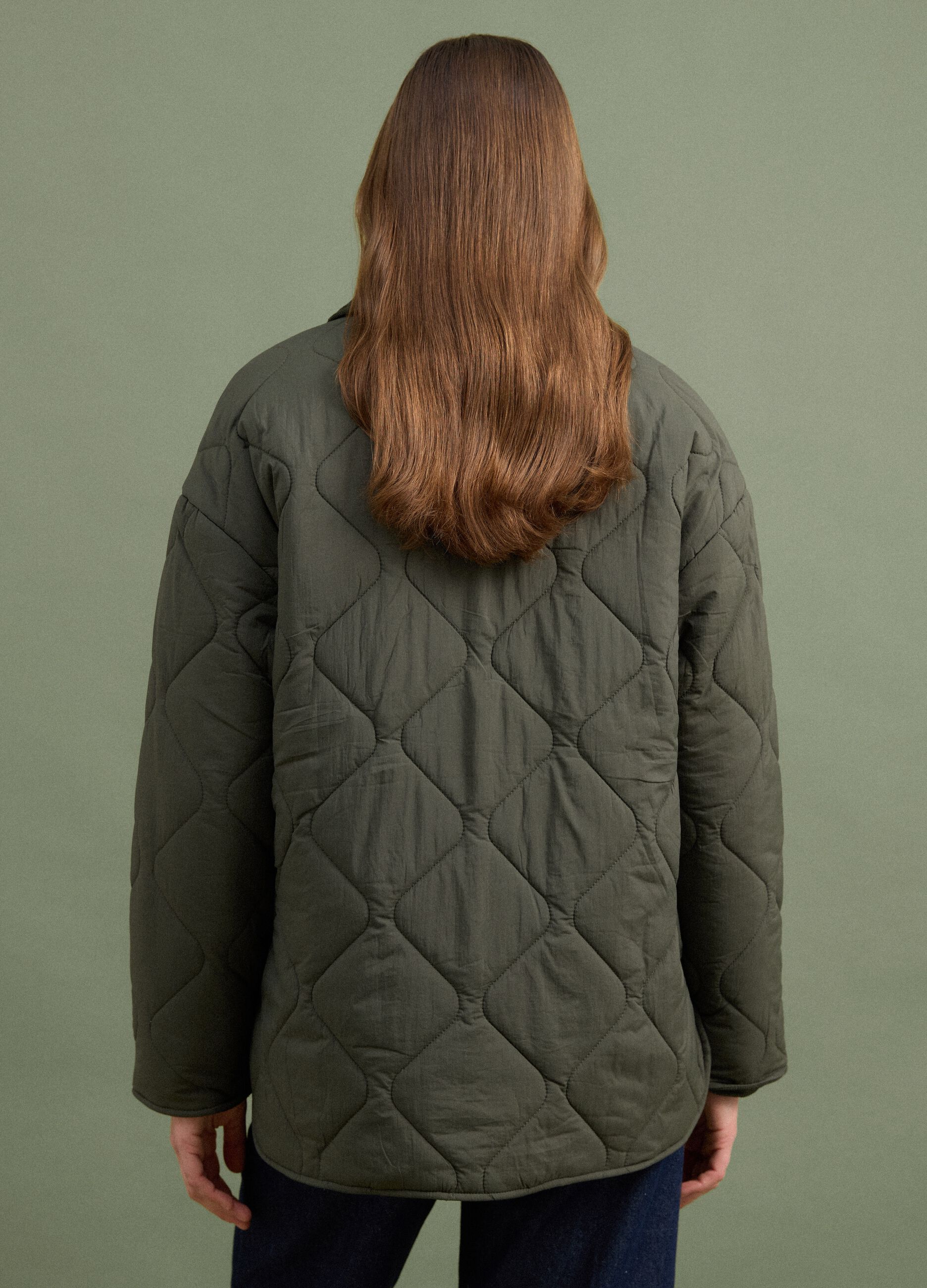 Green quilted padded jacket with buttons