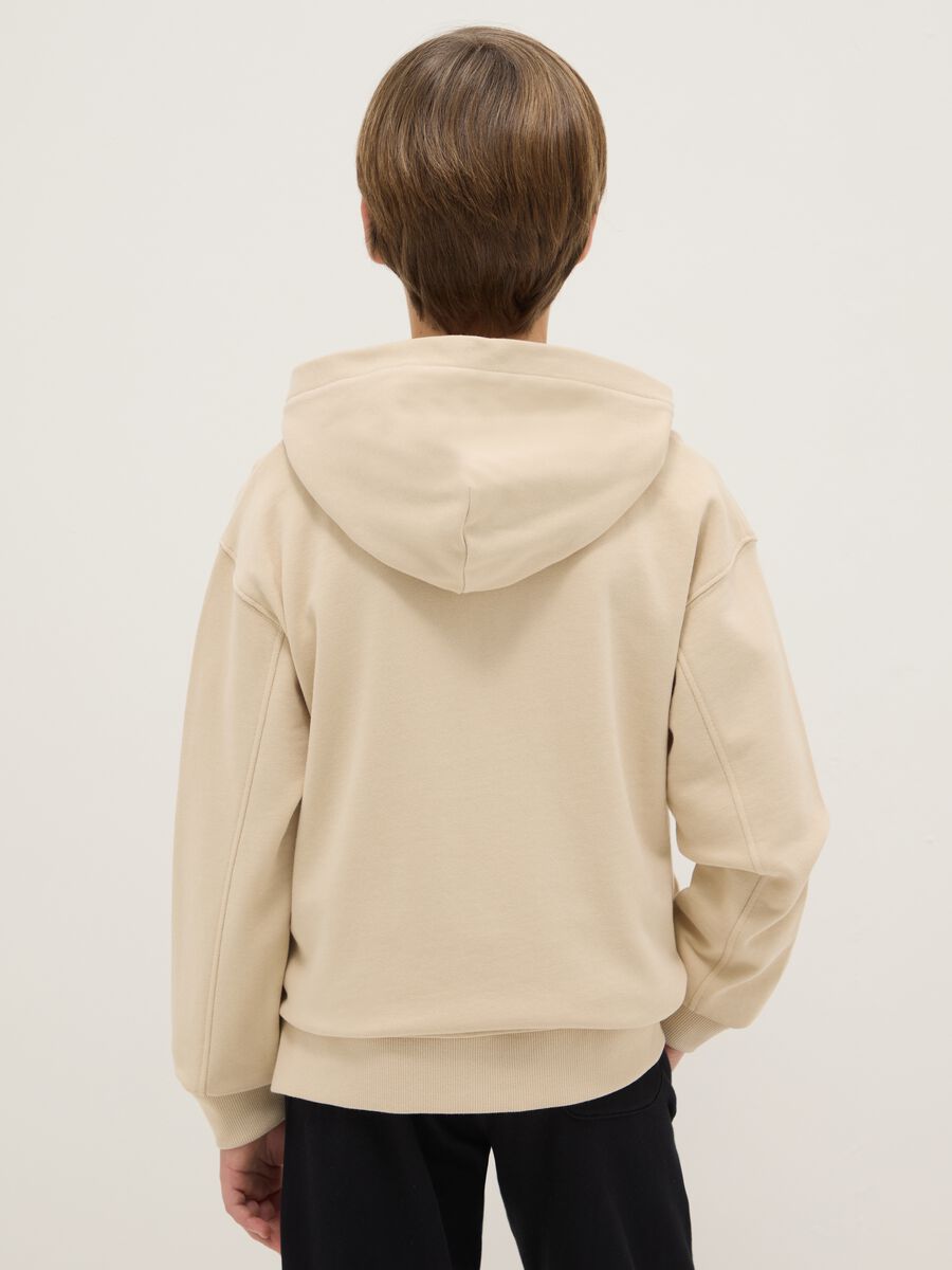 Beige hoodie for boys in pure cotton, oversized fit with hood and zip_1