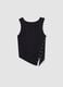 Black stretch cotton top with asymmetric hem and metal eyelets_4
