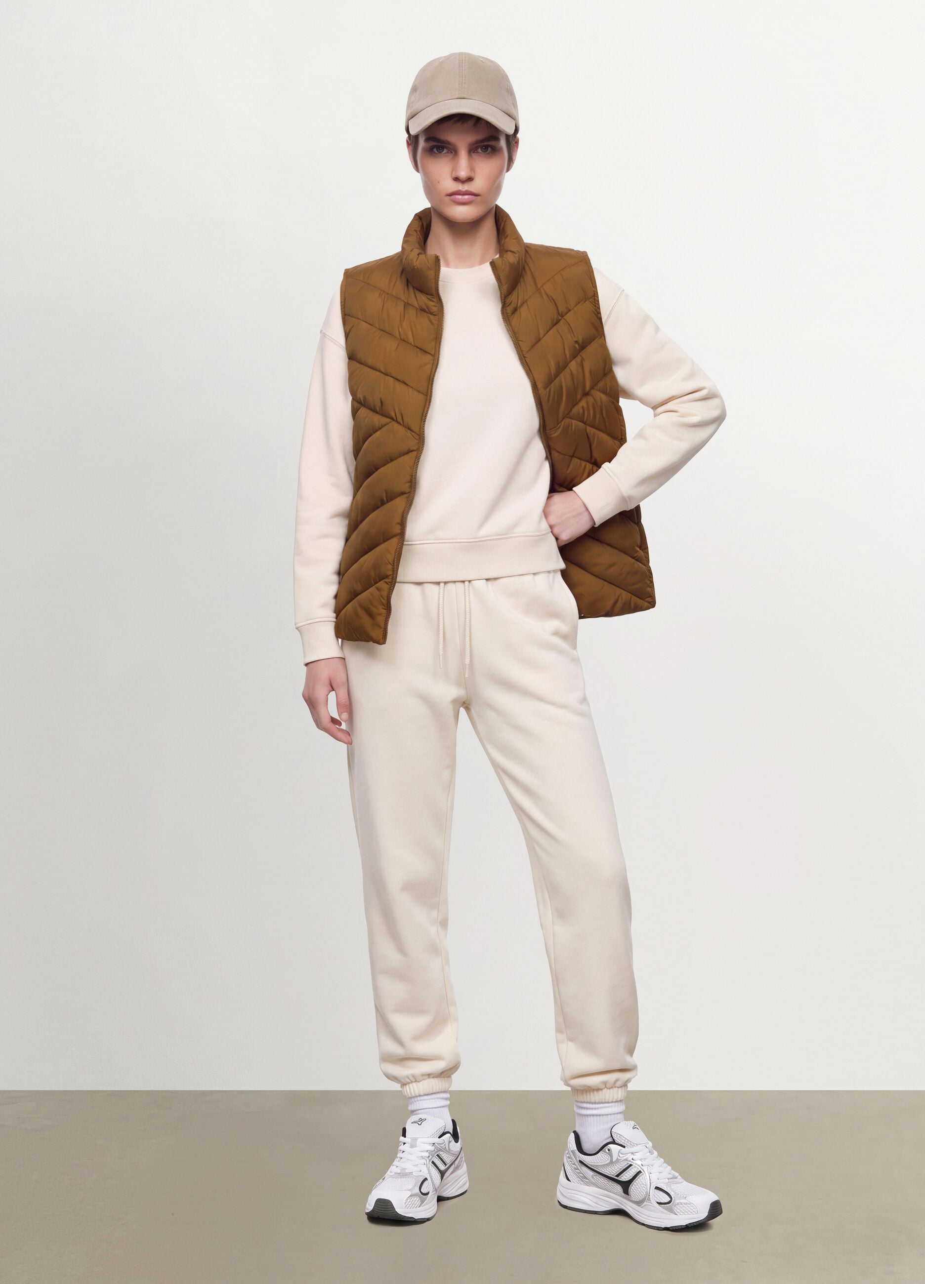 Yellow ultralight quilted gilet with zip and high neck