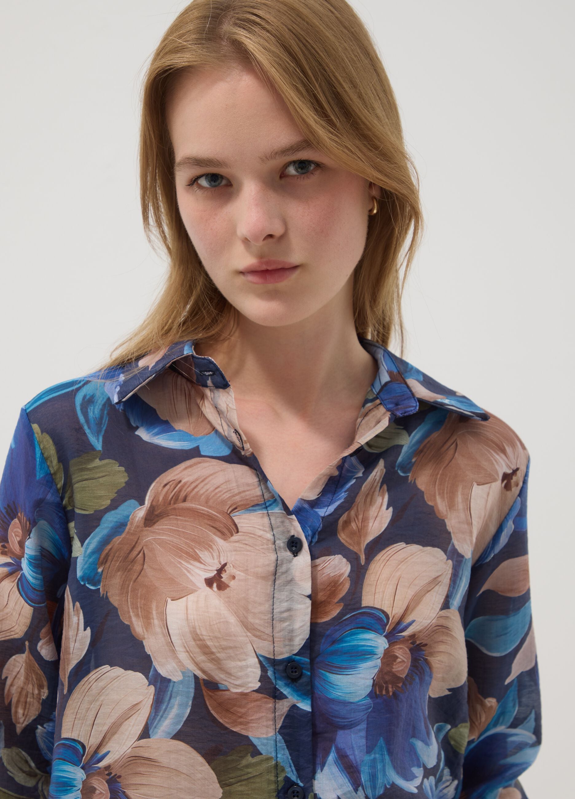 Blue lyocell-blend shirt with floral print