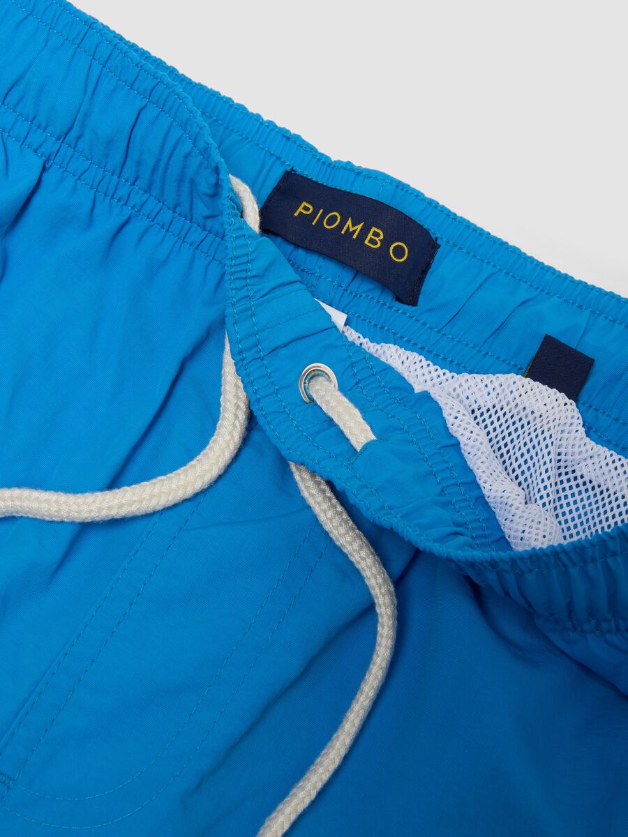 Boxer da mare azzurri con vita elasticizzata e coulisse_5