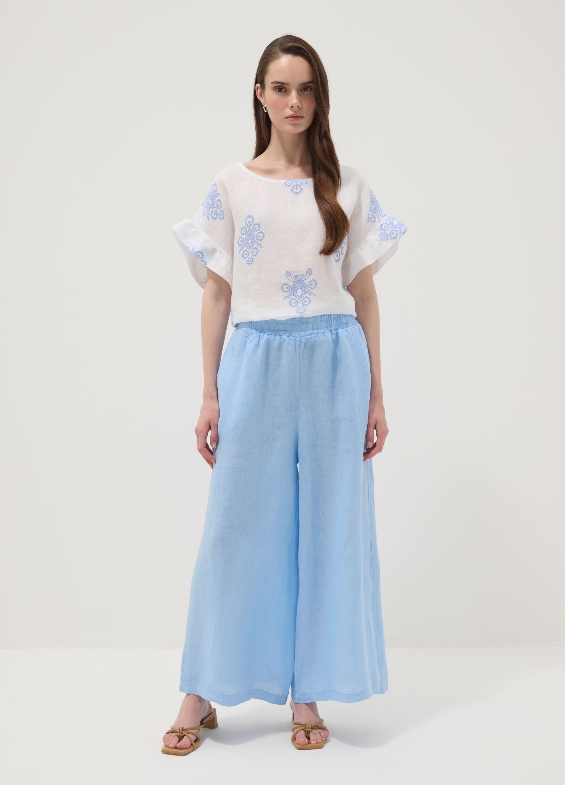 Light blue pure linen wide-leg trousers with a regular fit