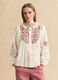 Camicia beige in puro cotone con ricami floreali_1