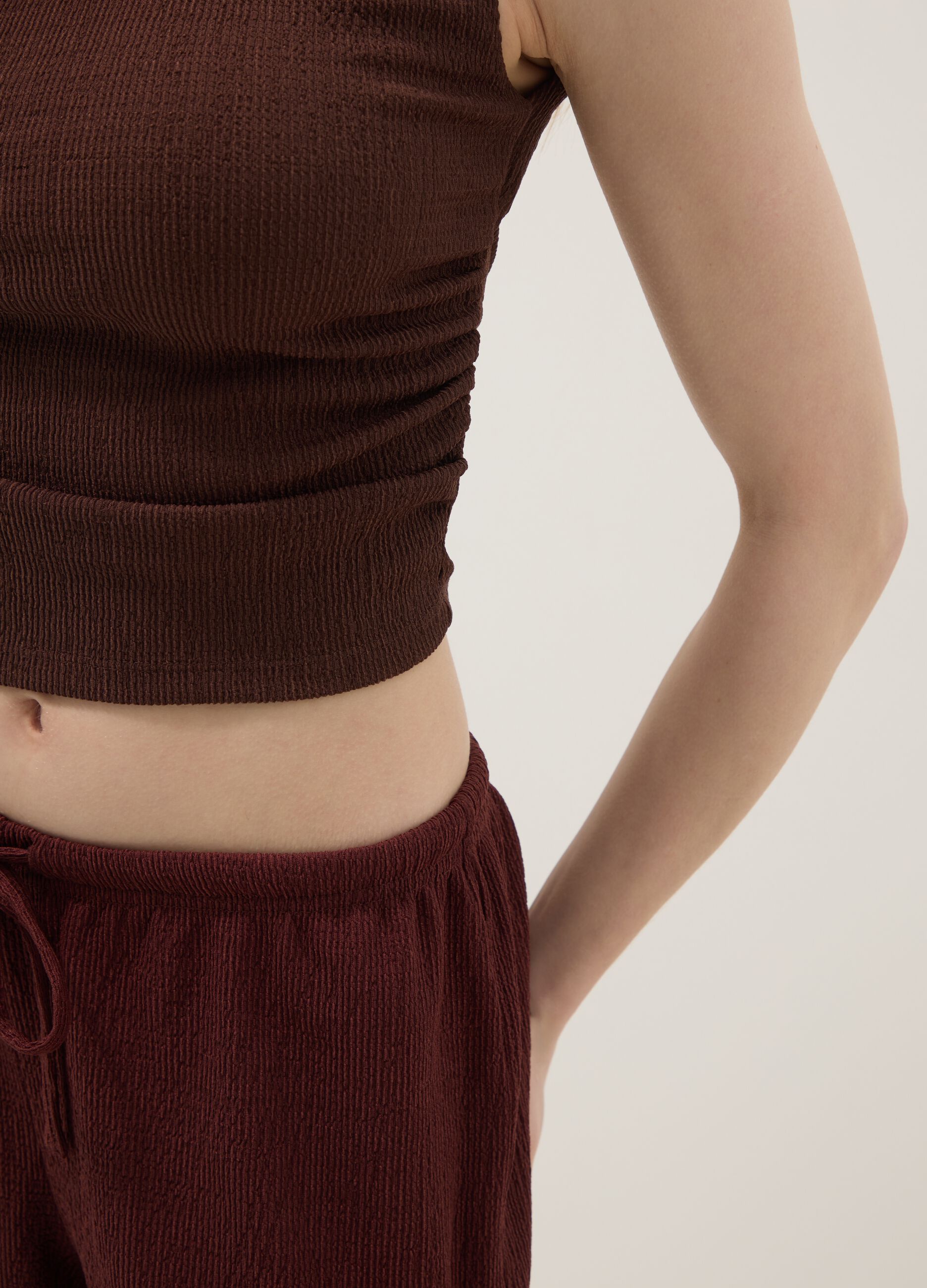 Brown stretch sleeveless top, regular fit