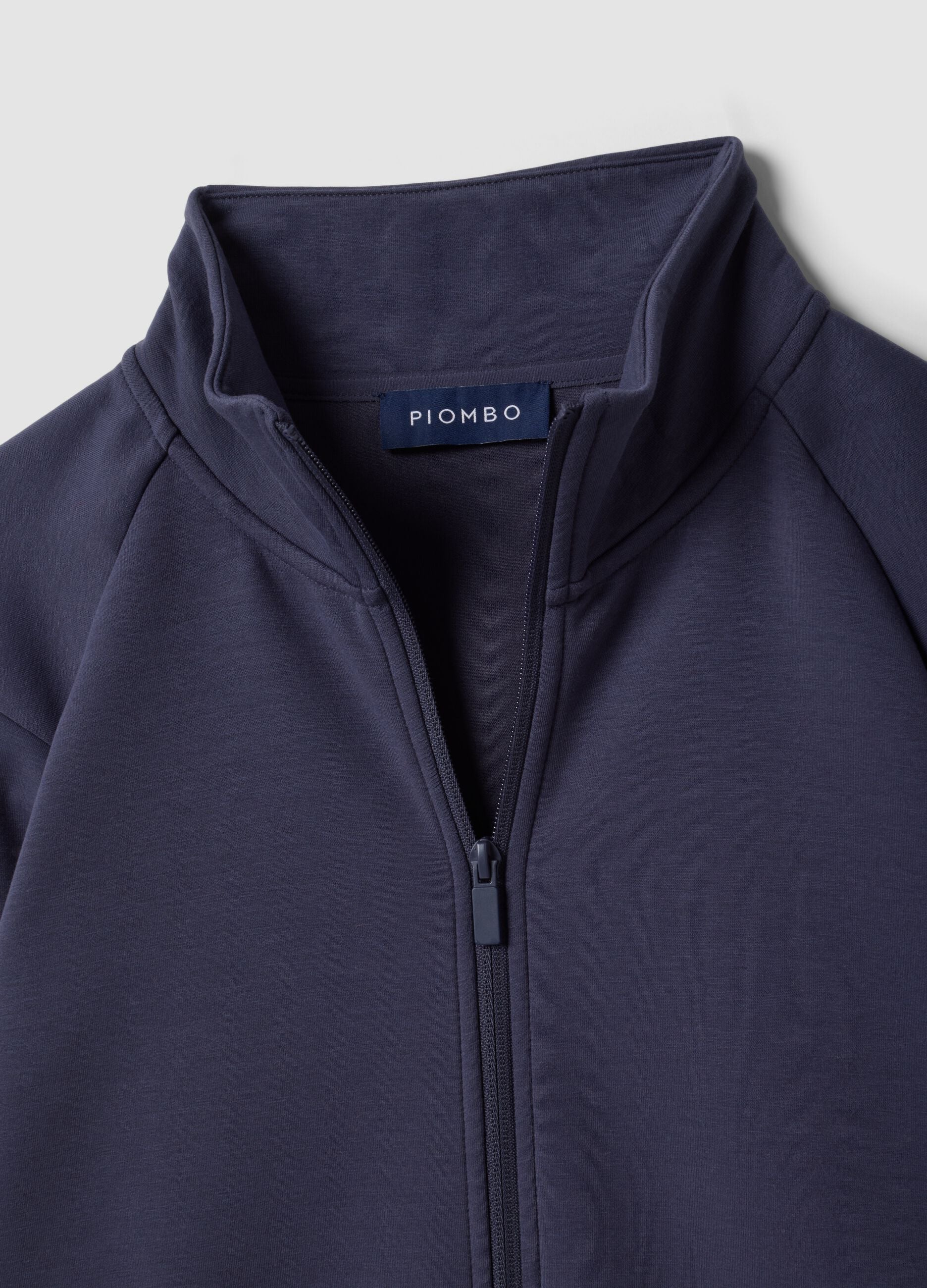 Blue full-zip jacket with stretch Easy Dry fabric collar, regular fit