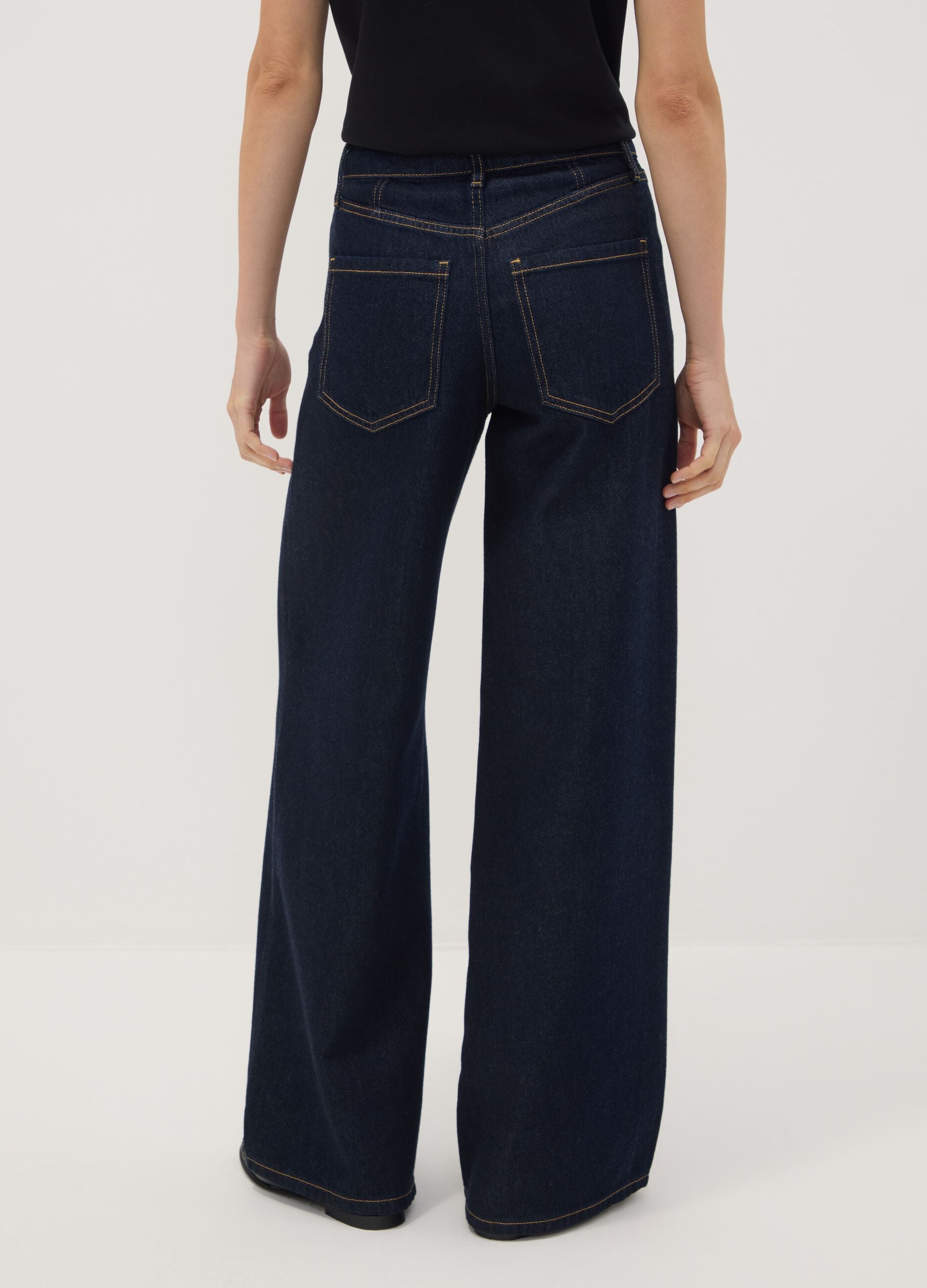 Blue denim bootcut jeans in cotton and lyocell blend